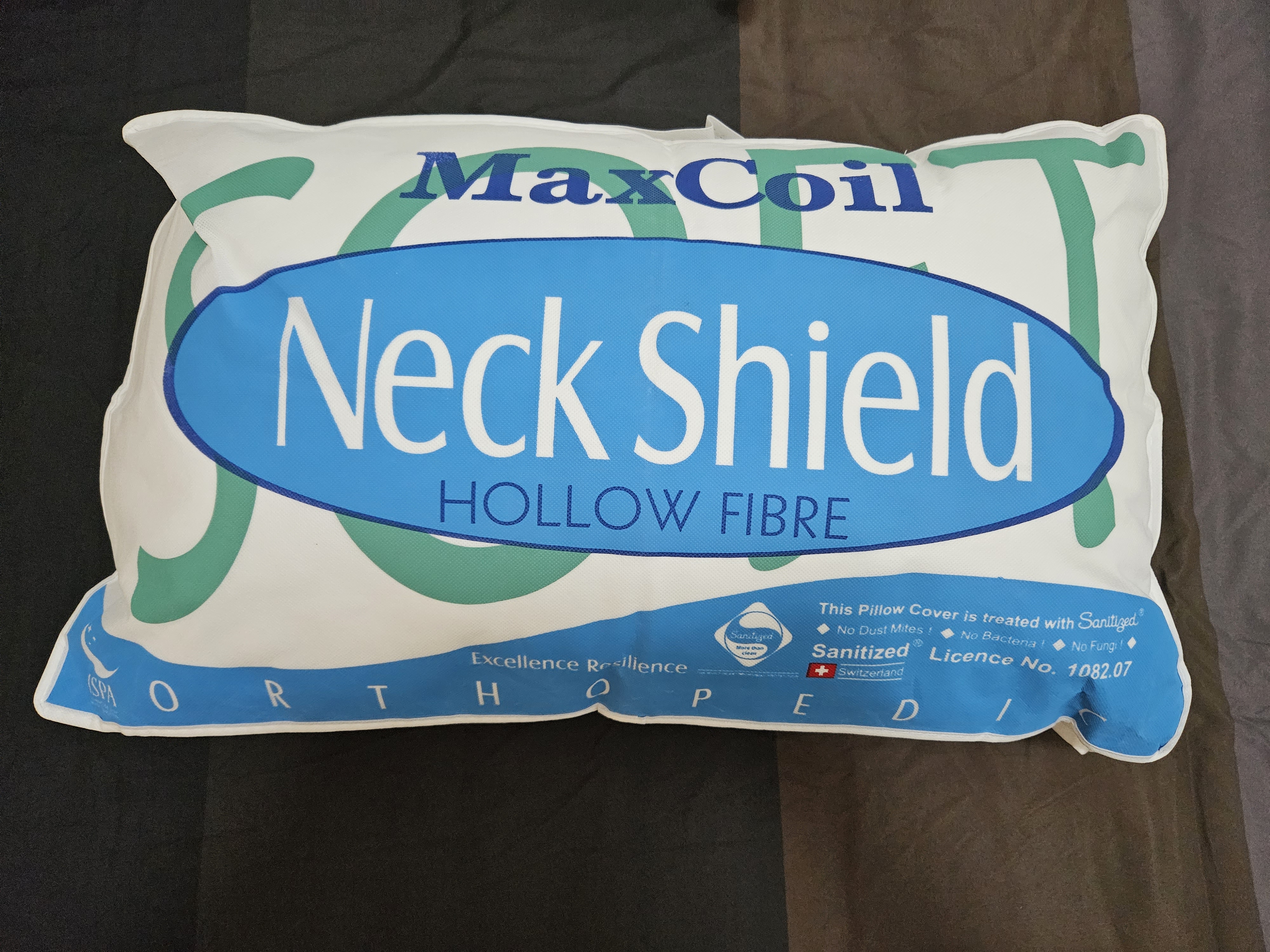 Customer home photo 1: Firm feeling. Great value of money spent. Like the good support around neck and head. Suitable for who does not like too-fluffy pillow!