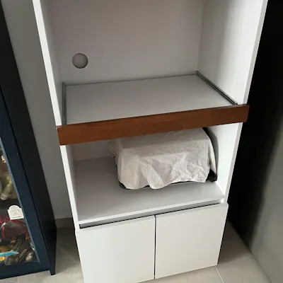Customer home photo 1: Thin and sleek , with a movable cabinet for retrieving things easily
