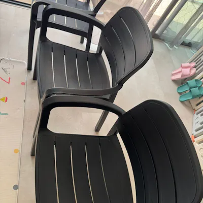 Customer home photo 1: comfy and weather resistant. going to put at balcony for dining. glad that we picked this with armrest! no regrets. Price was reasonable i think