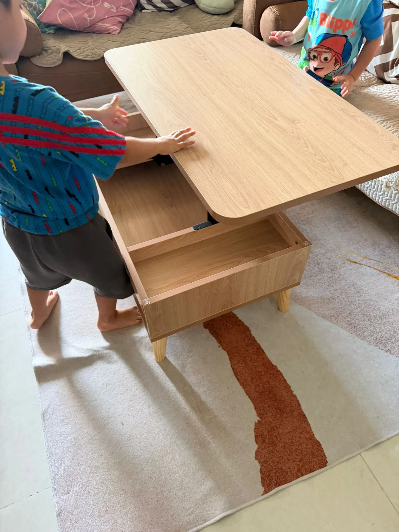 Customer home photo 26: Functional, solid, ergonomic and stable, my kids use the height differential for eating their dinner and for studying/ drawing. So convenient and smart!