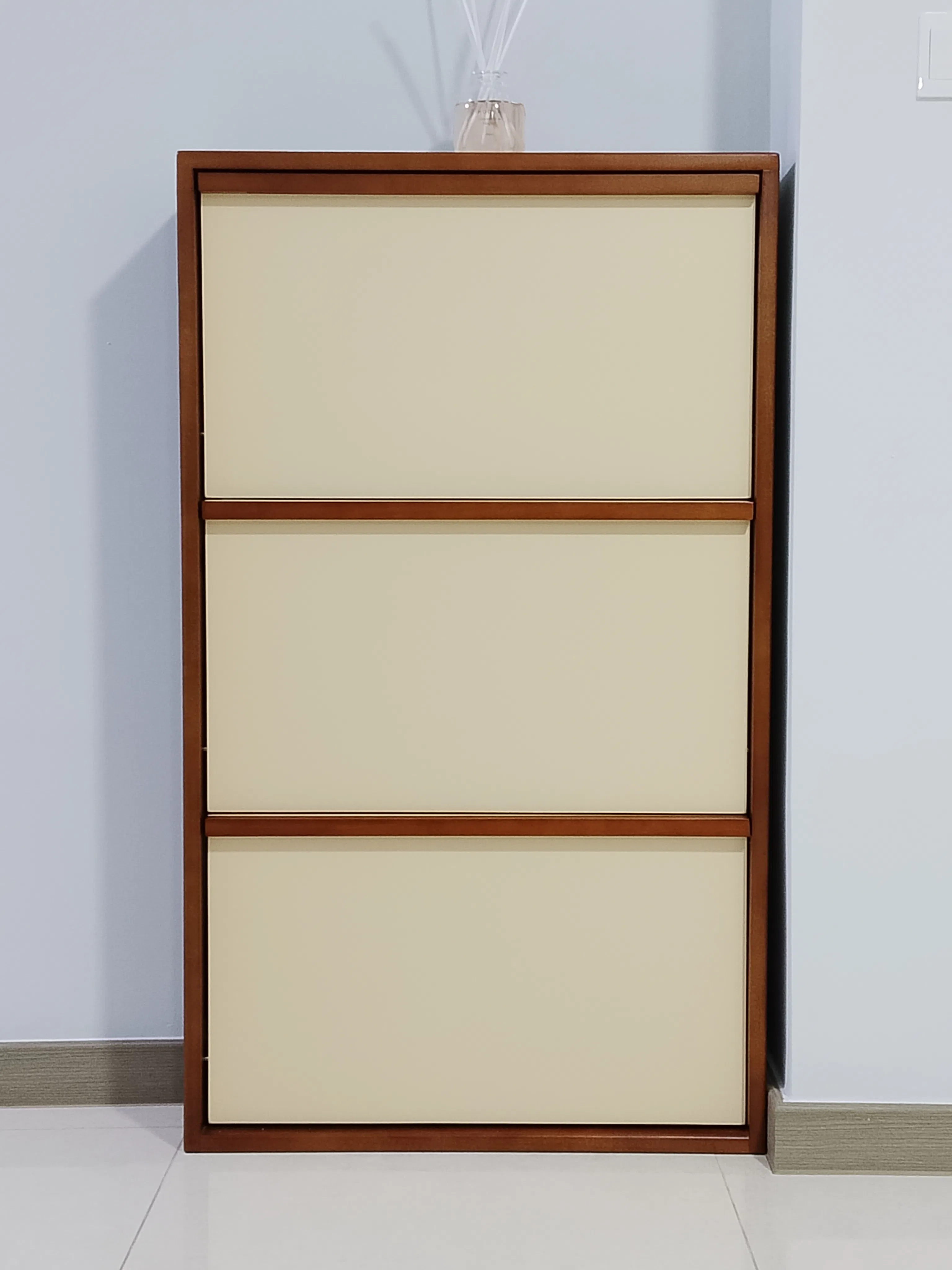 Customer home photo 1: I've been looking for a shoe rack that doesn't take up too much room, especially in terms of depth. This is the ideal piece I desired.