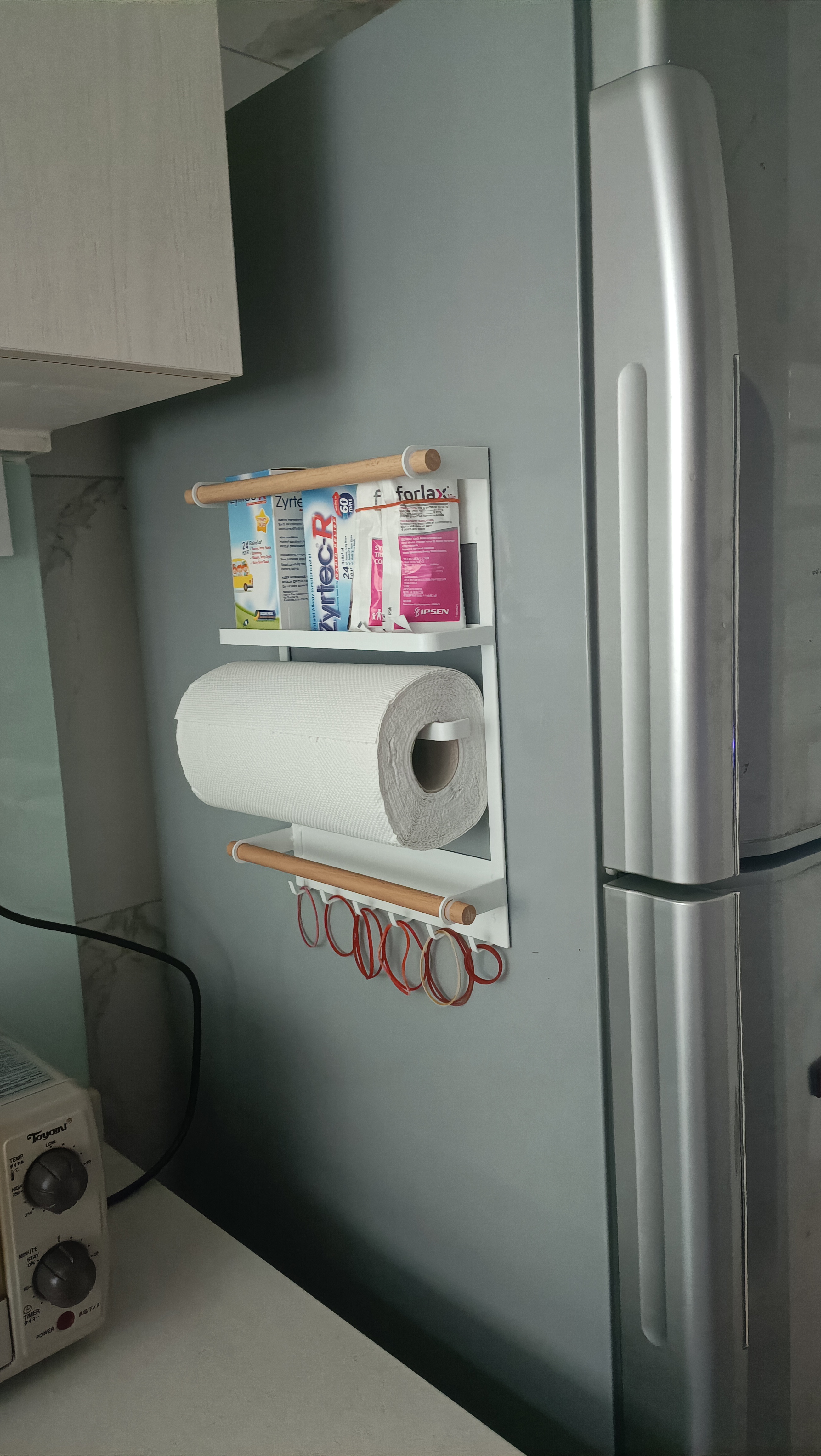 Customer home photo 3: The magnetic rack works very well and looks cute on the fridge!