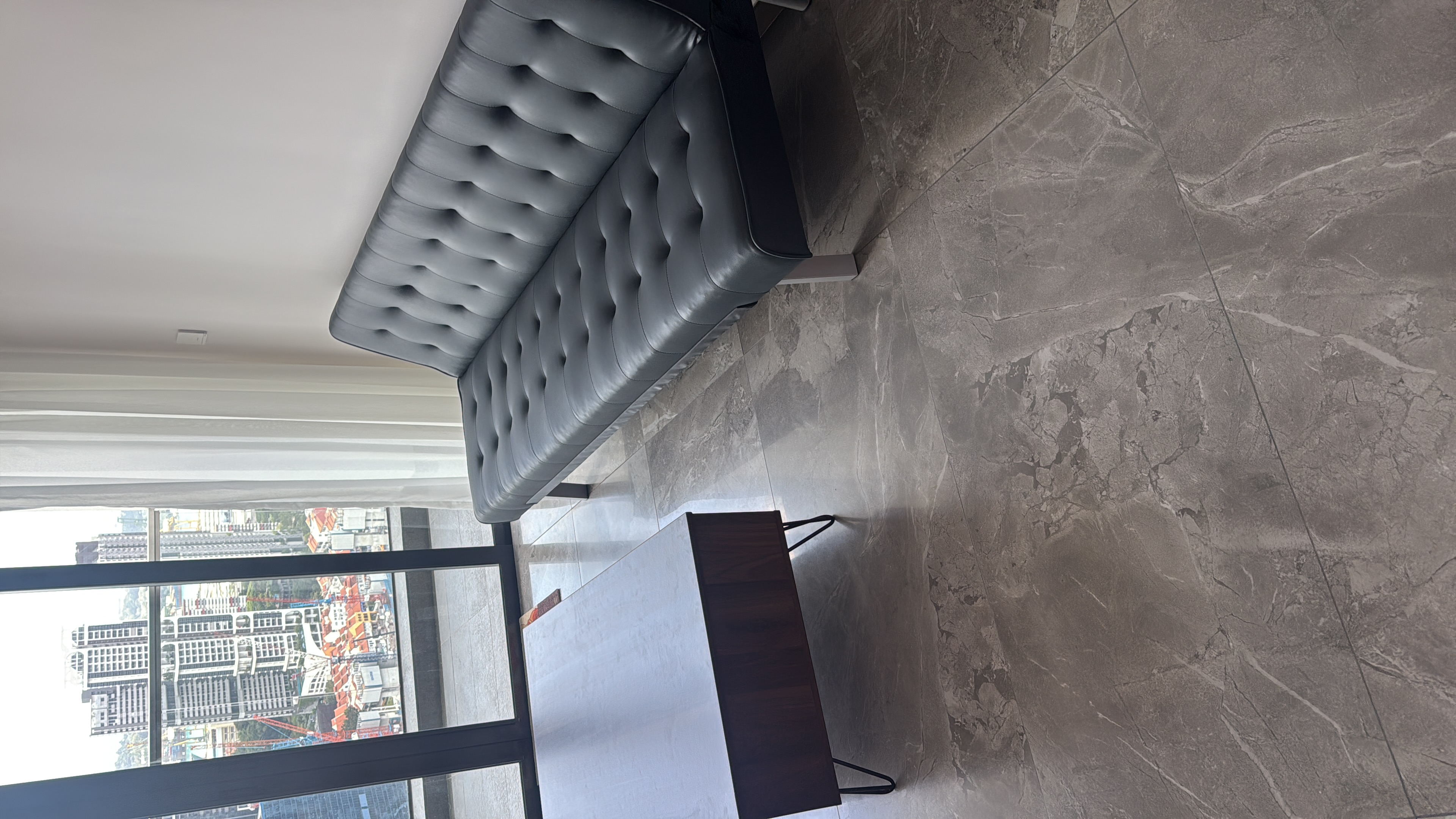 Customer home photo 1: Missing out a carpet below the table.