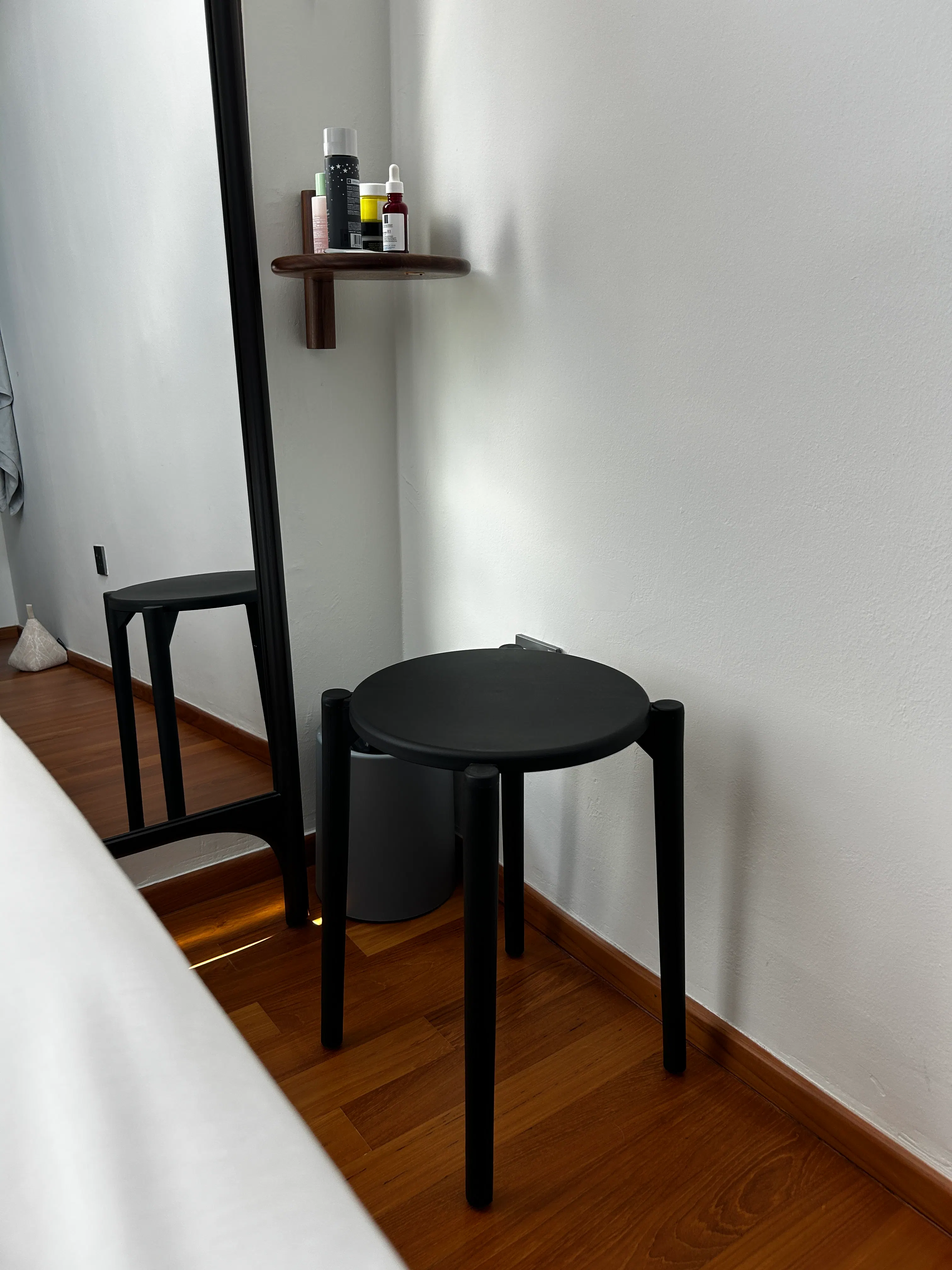 Customer home photo 1: Olly Monochrome Stackable Stool – Black. Great value for money.  It’s a simple and solid stool.  It feels sturdy and stable, with a clean, minimalist look that fits easily into any space. The stackable feature is also very practical for storage. Overall, a straightforward and reliable stool that meets expectations.
