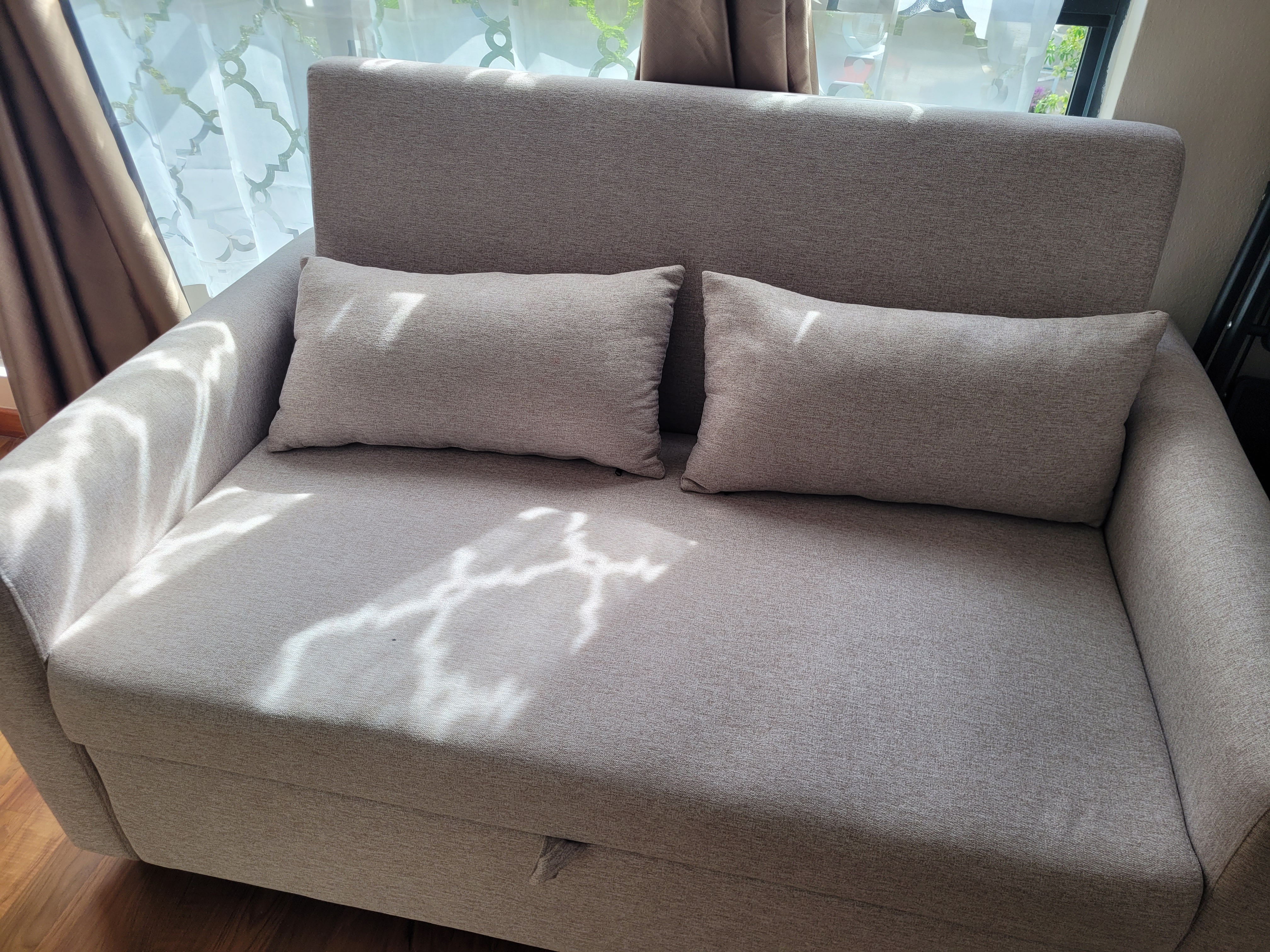 Customer home photo 11: I like the material, its smooth. And its easy to operate the sofa bed.