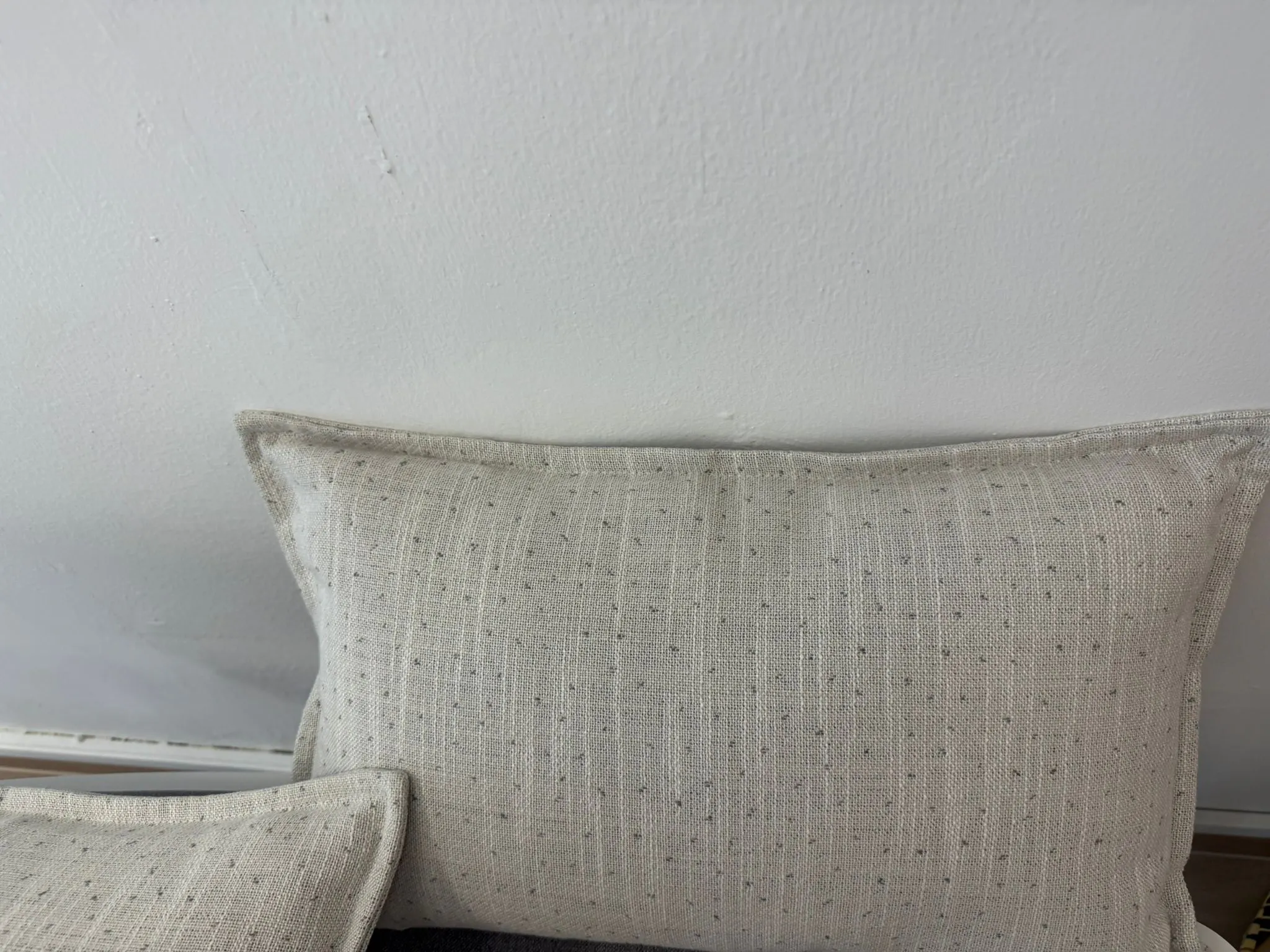 Customer home photo 1: The 2 lumbar cushions fit well on a 1m bench, and are firm enough to give support.