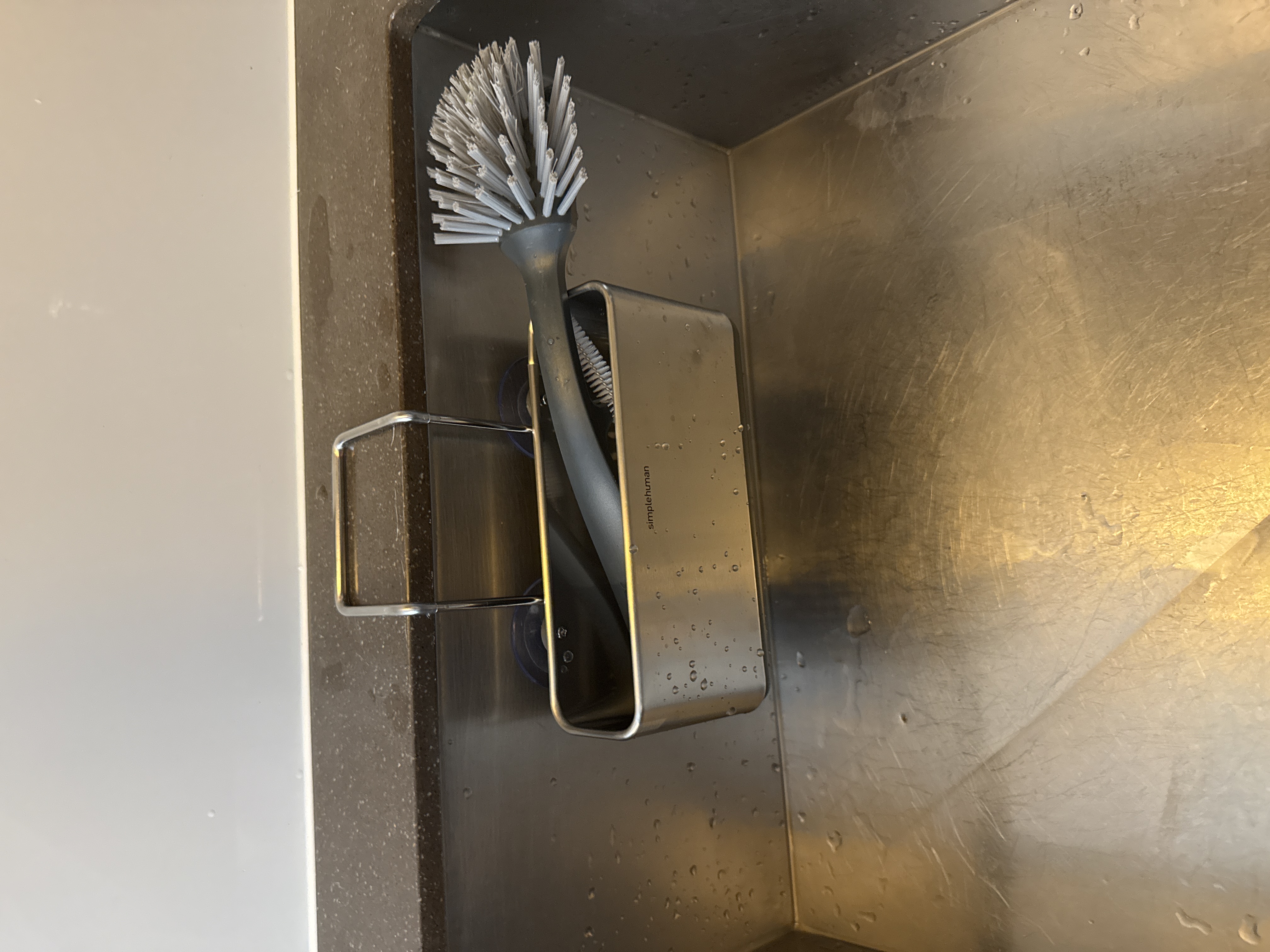 Customer home photo 2: Like it, could have been a little bigger just to fit the brush better. Overall very happy, sits great in the sink.