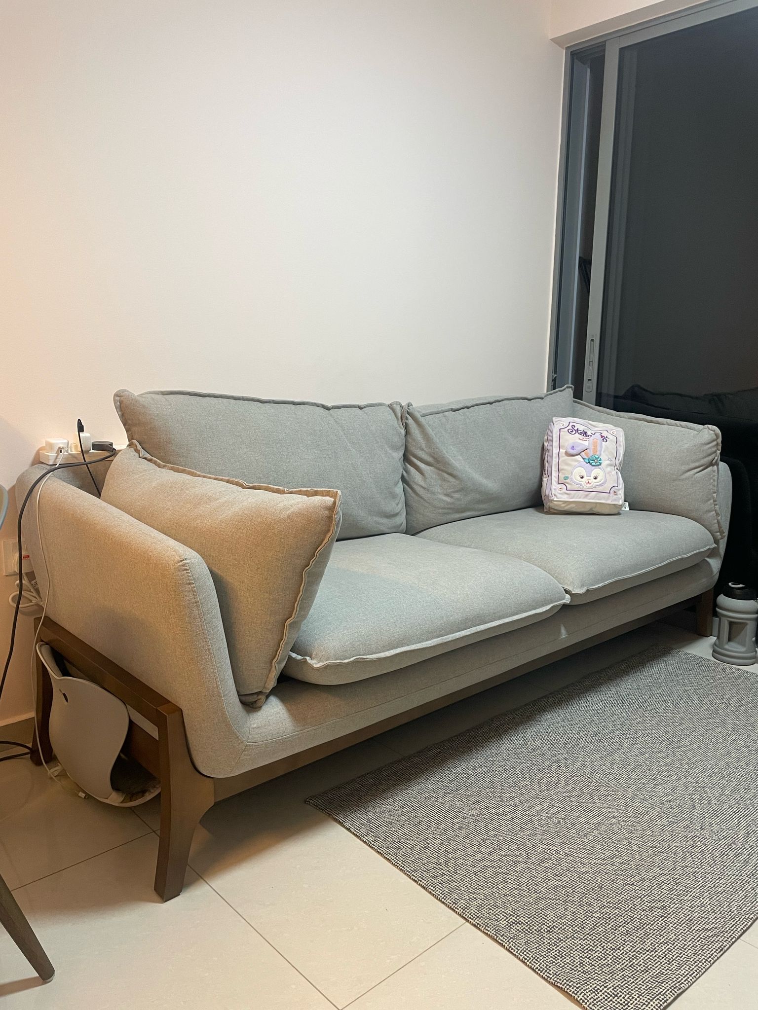 Customer home photo 1: Sturdy sofa and firm cushions! A great, durable piece of furniture. Though, a word of caution: if you've got kids, maybe go with a darker color!