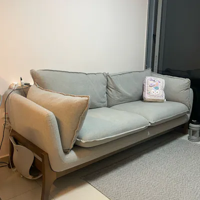 Customer home photo 1: Sturdy sofa and firm cushions! A great, durable piece of furniture. Though, a word of caution: if you've got kids, maybe go with a darker color!