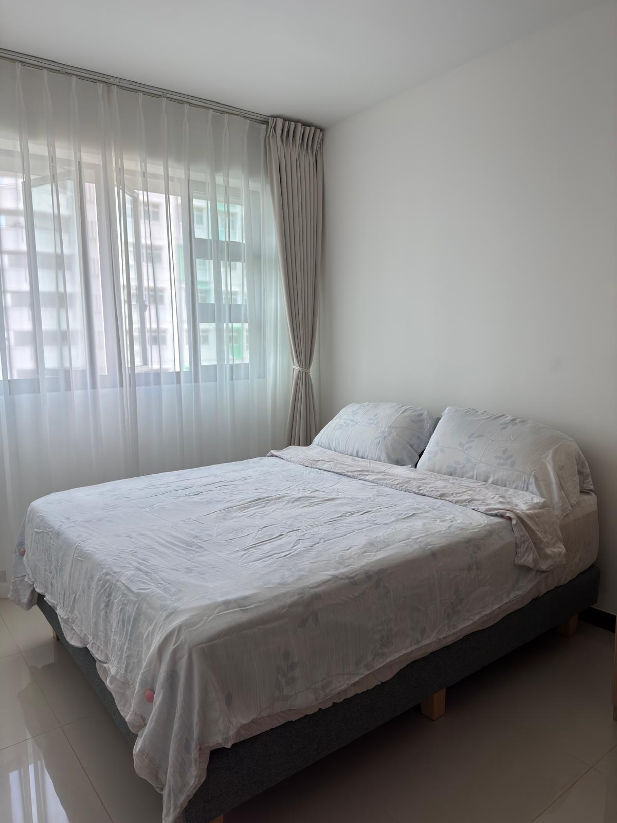 Customer home photo 1: Love the matcha-grey tone paired with natural wood legs. The absence of a headboard makes the design look sleek and minimalist. Perfect for a clean, uncluttered look. Sturdy yet simple, with just the right height