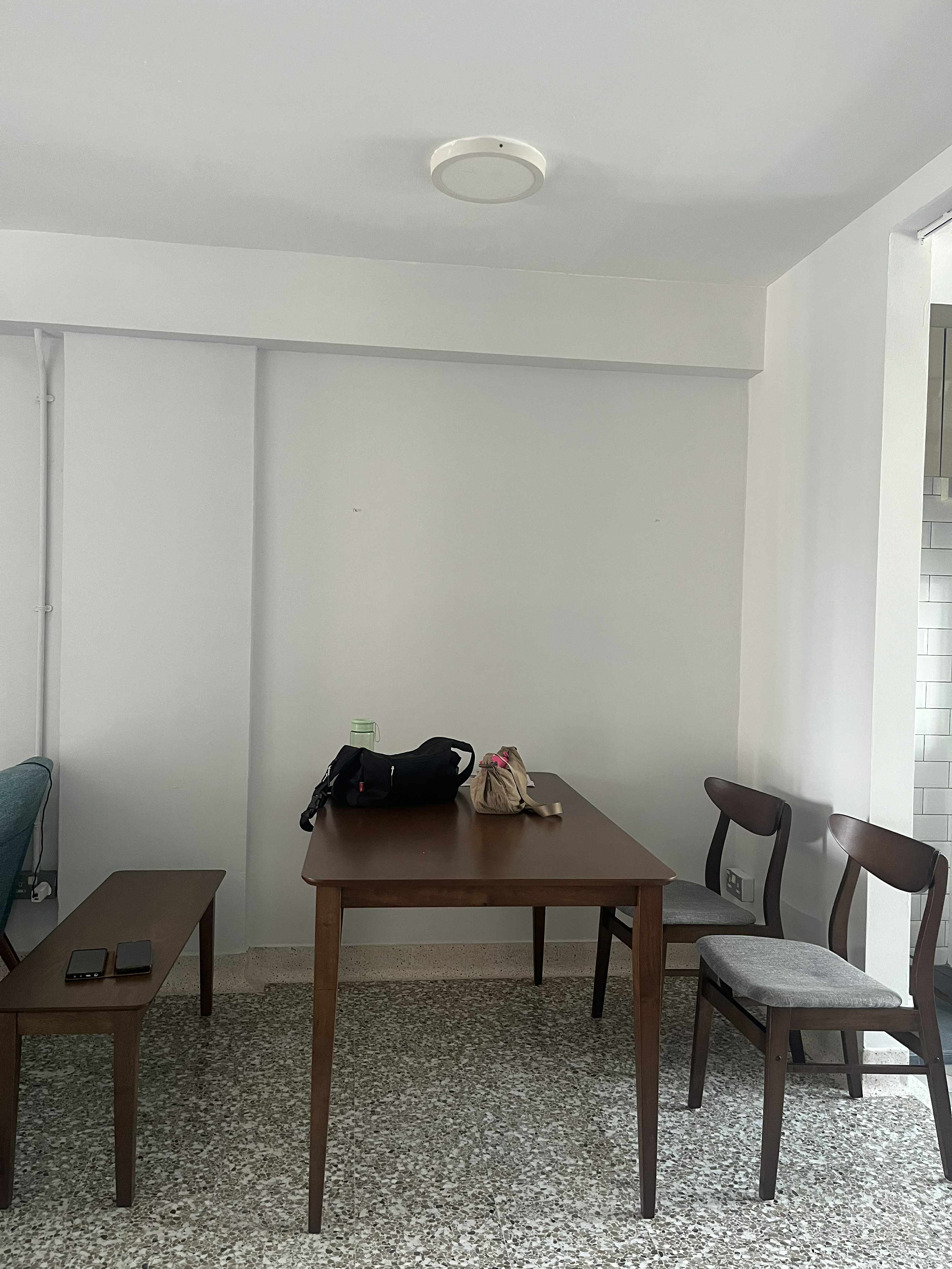Customer home photo 1: The dining set looks classy and sleek. We love the bench; it adds modernity to the vibes. However, we have observed that there is a creaking sound from the chair when a heavy person sits on it.
