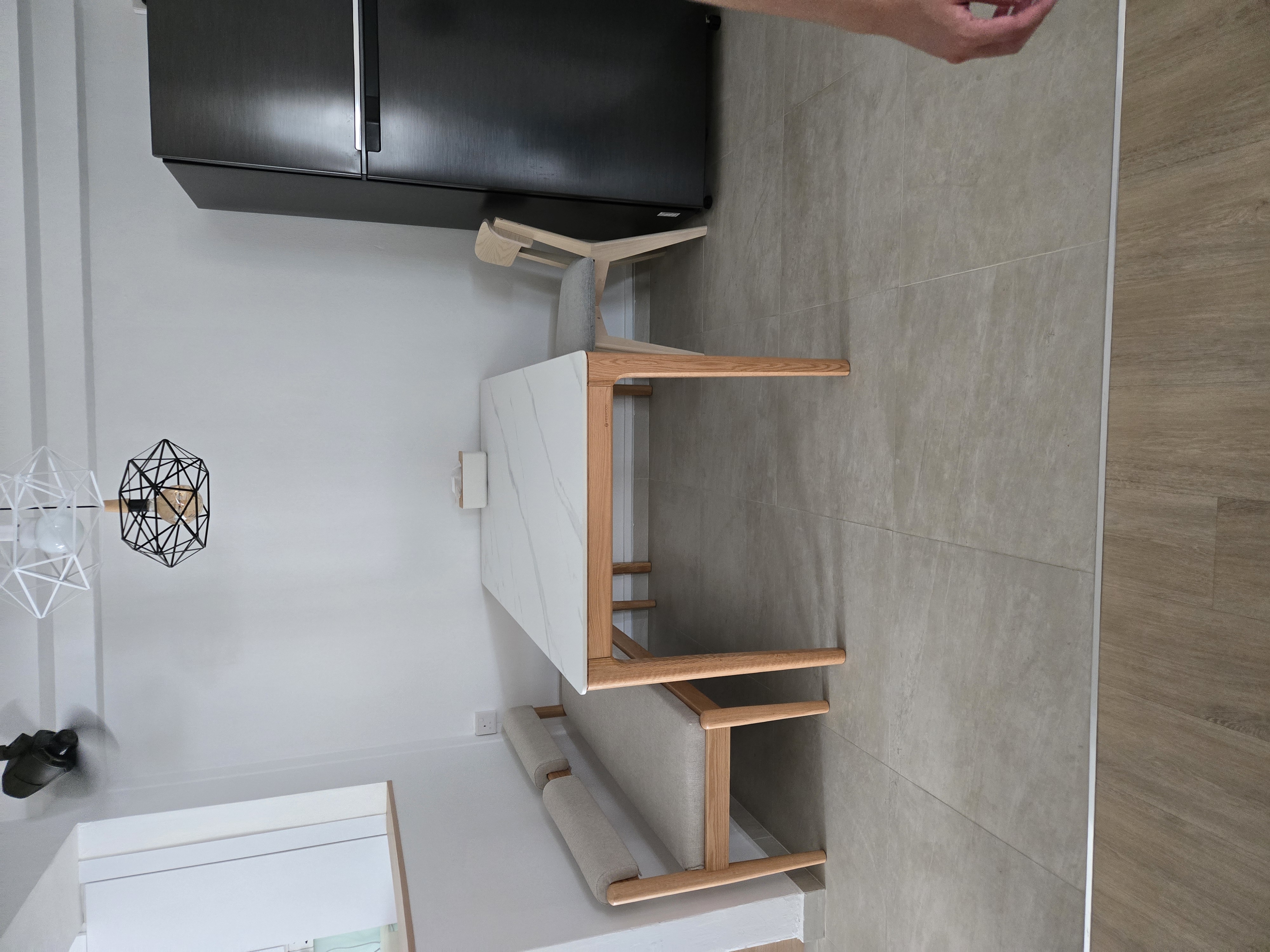 Customer home photo 8: Saw at showflat n my boy like it thoigh abit low for me against dining table but its very comfortable n match well. Overall happy as it sits nicely against my wall