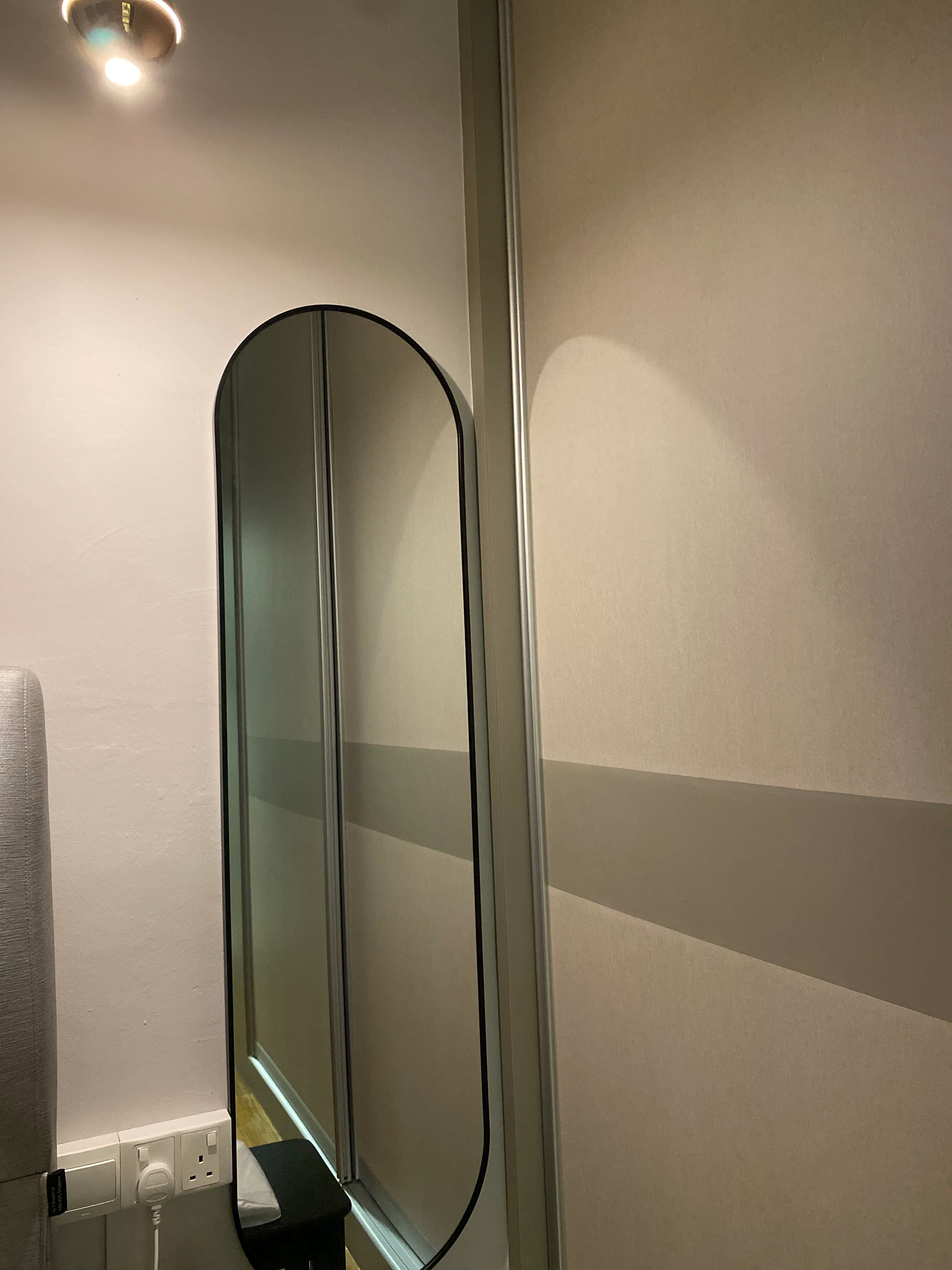 Customer home photo 3: Nice curvy mirror. Good quality. Just nice for for me to place beside my wardrobe.