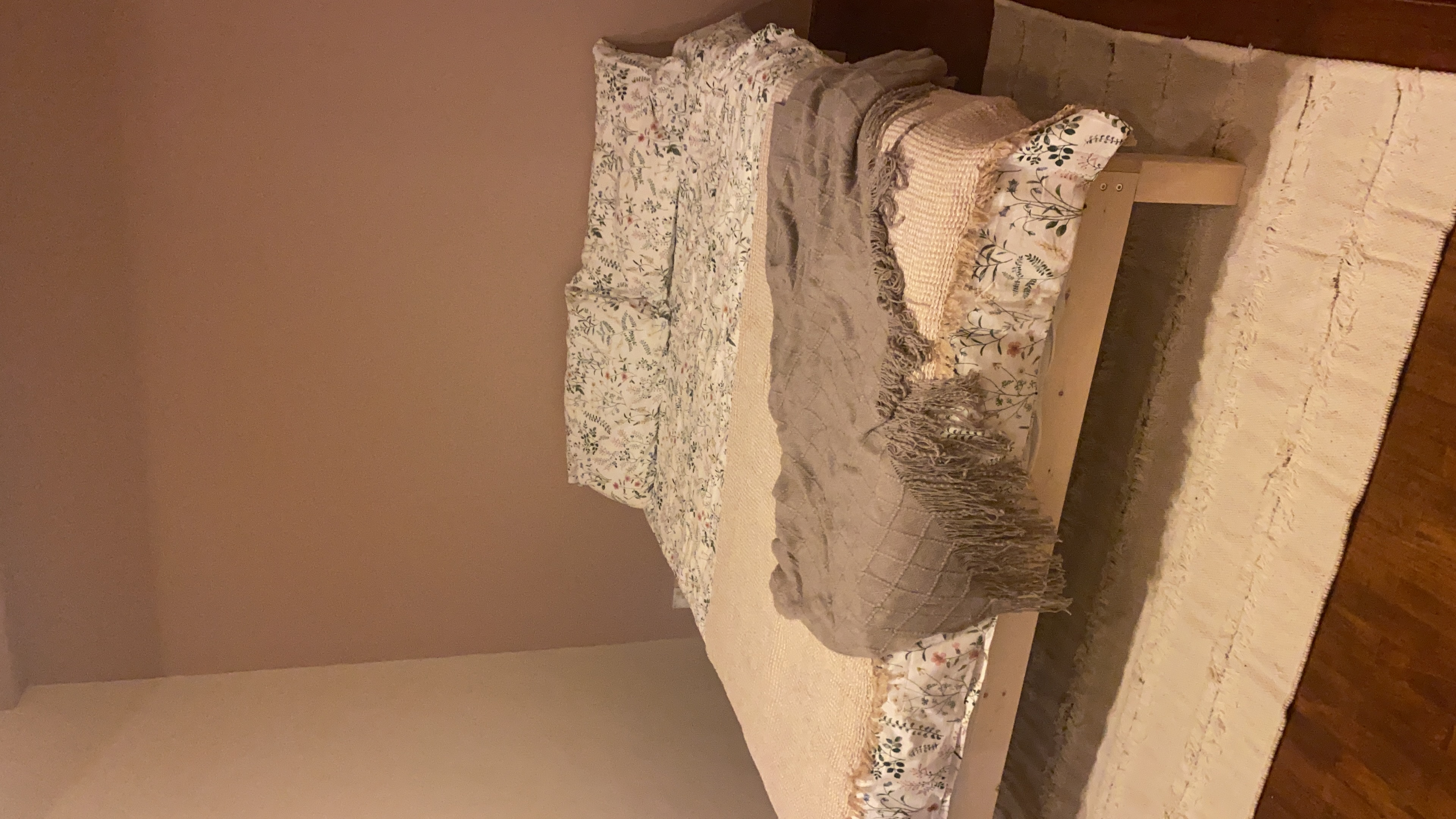 Customer home photo 10: Solid, basic bed frame. Very light wood. Seems sturdy enough but only had it for a few days now. We added our own headboard