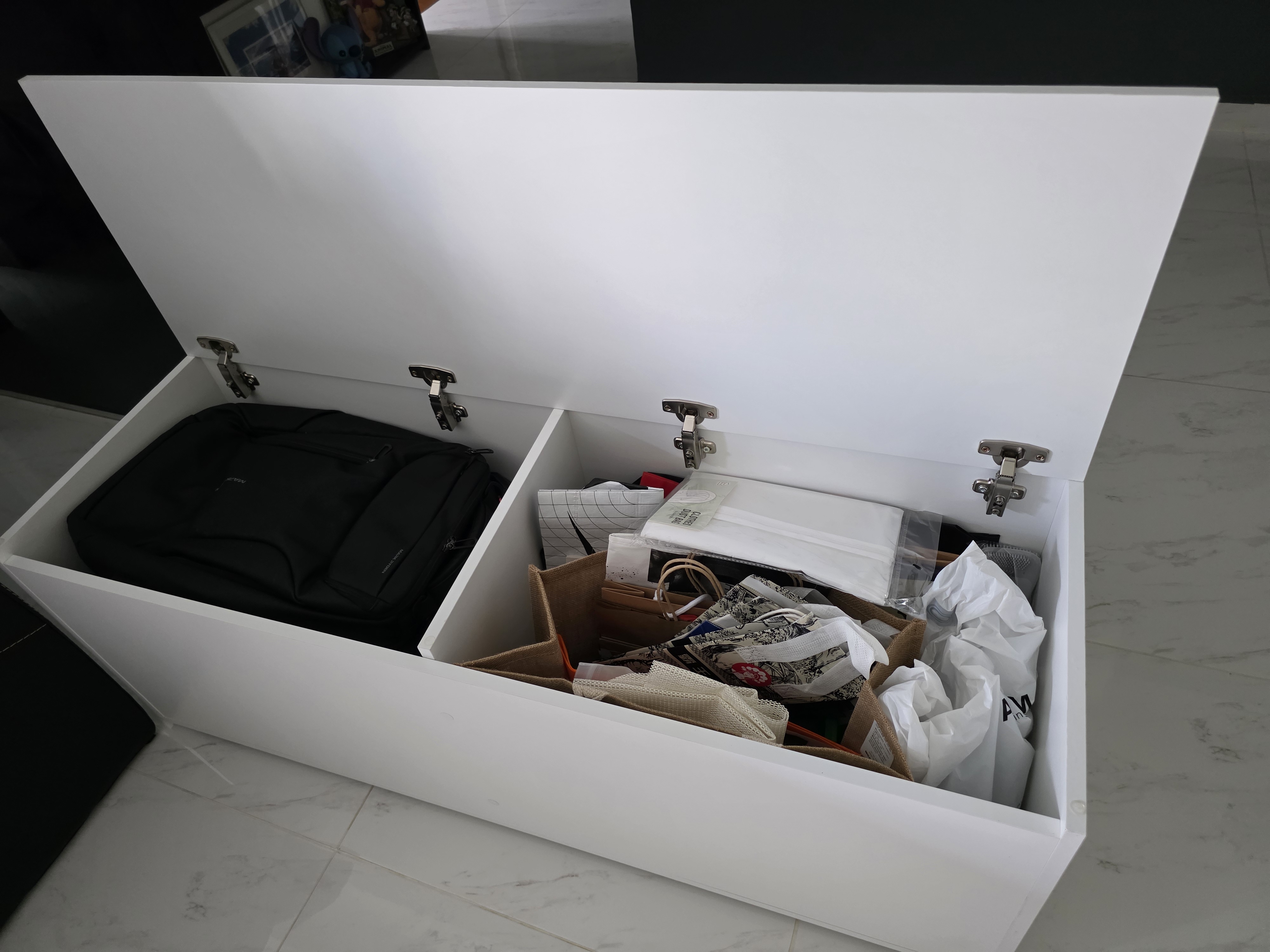 Customer home photo 1: Huge storage with soft closure. Good design to have a divider in between to separate compartment.