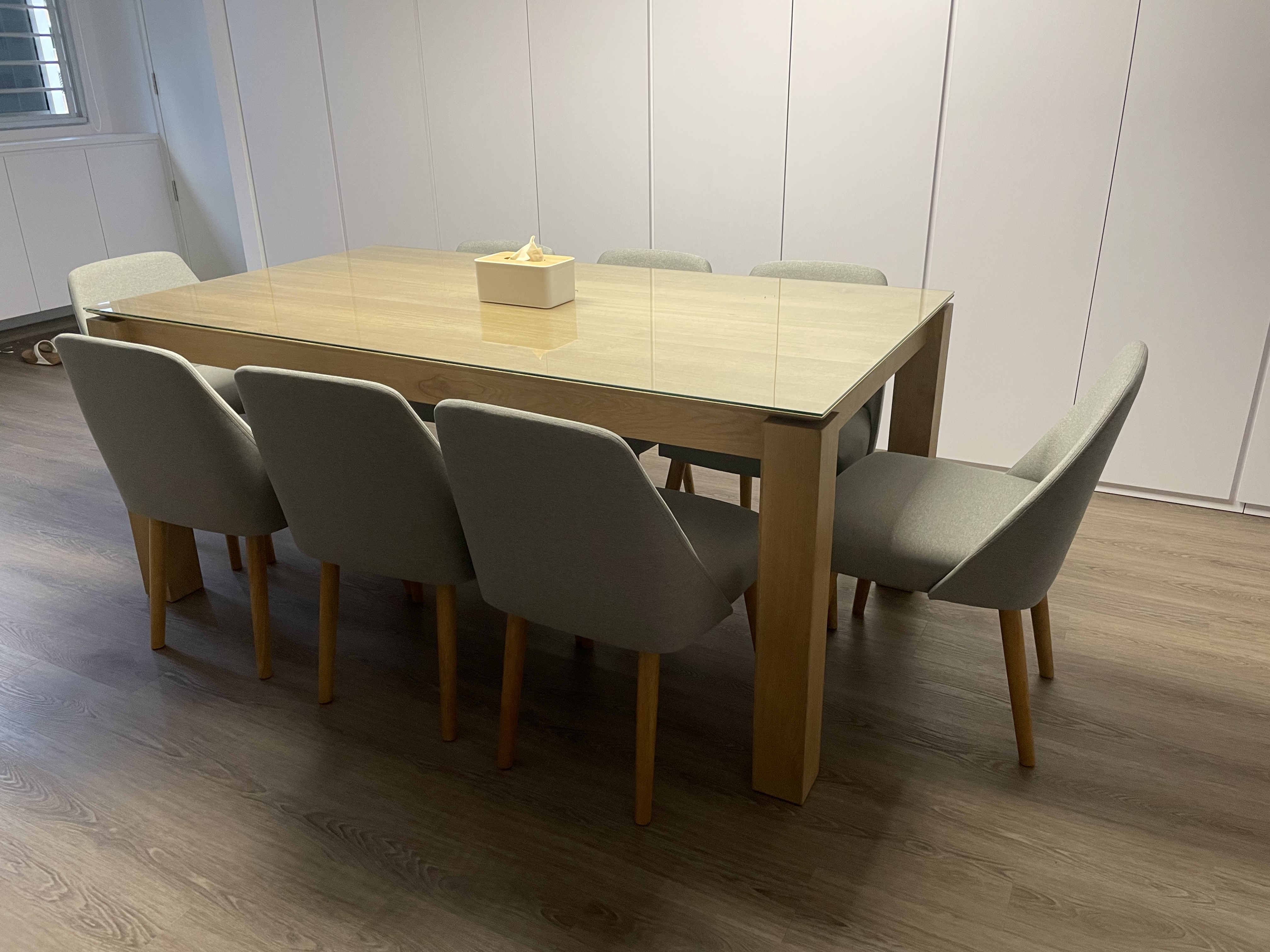 Customer home photo 7: I love the colour of the fabric and the oak legs which match my dining table. The chairs were also very comfortable.