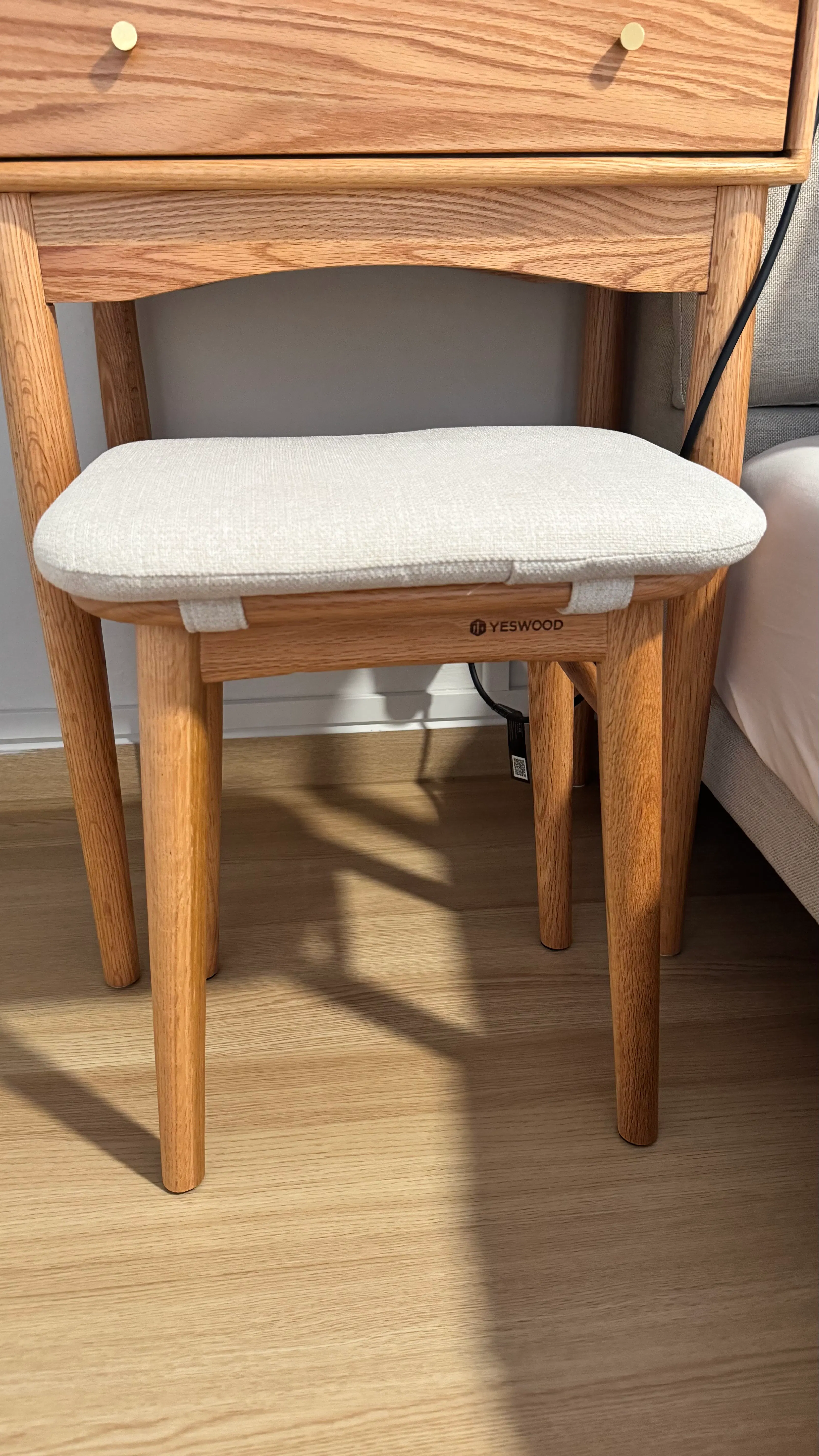 Customer home photo 1: Fits under the dresser and it matches too. Quality is according to expectations!
