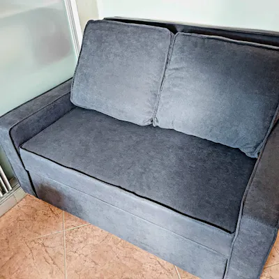 Customer home photo 4: Such a great little 2 seater for my dad's study, really ties up the room in a nice way. Sofa itself is comfy and pull out is very easy to use. Its medium firm, but the pillows are very squishy and soft. Love it so much~