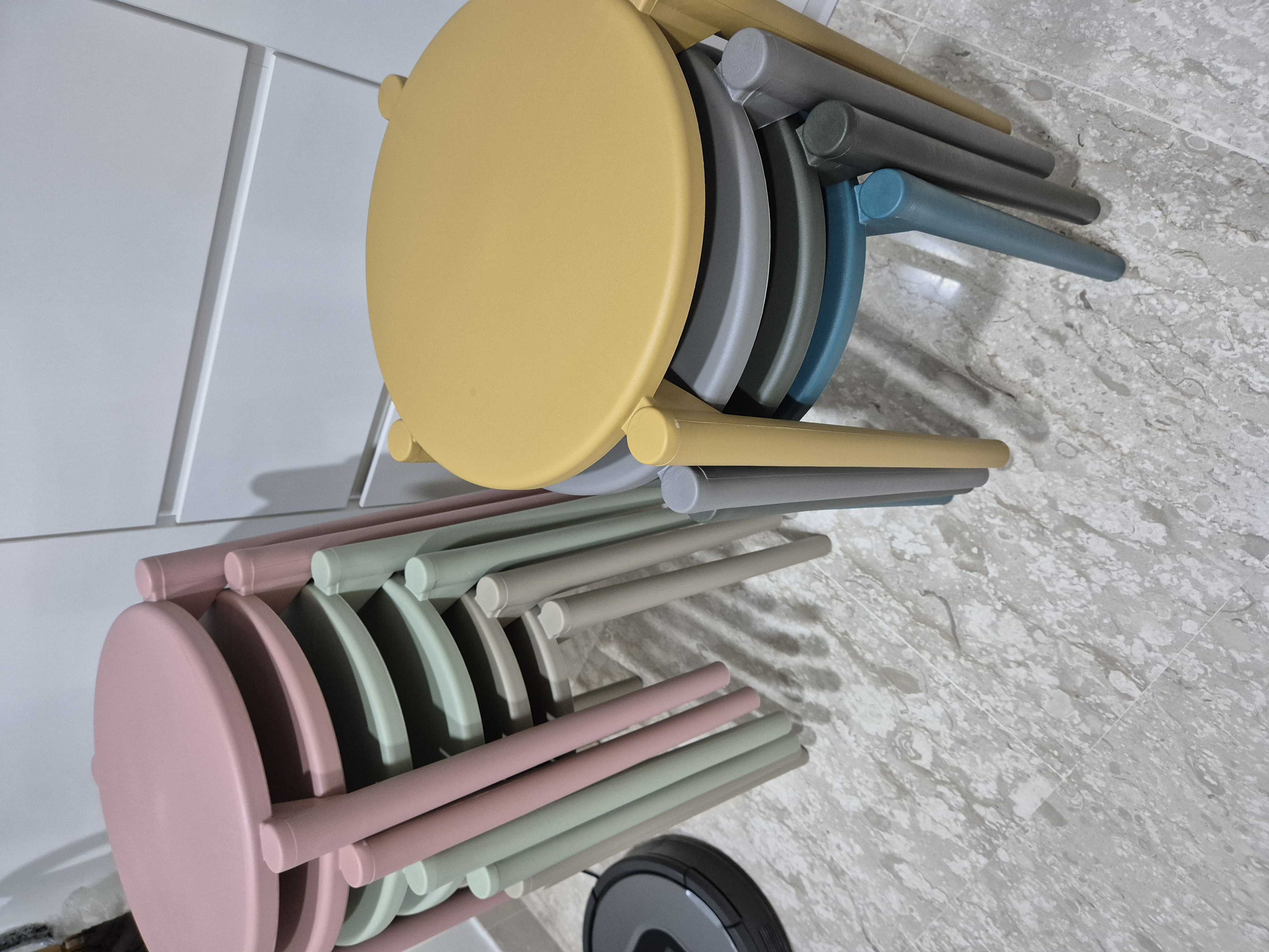 Customer home photo 6: Stools were well protected when delivered - the seats of the stools were wrapped with thin foam sheets/bubble wrap, while the legs were wrapped in plastic. Stool is light weight, sturdy and pretty. 
The taupe ones are a bright earthy brown, not dull at all. Nice.