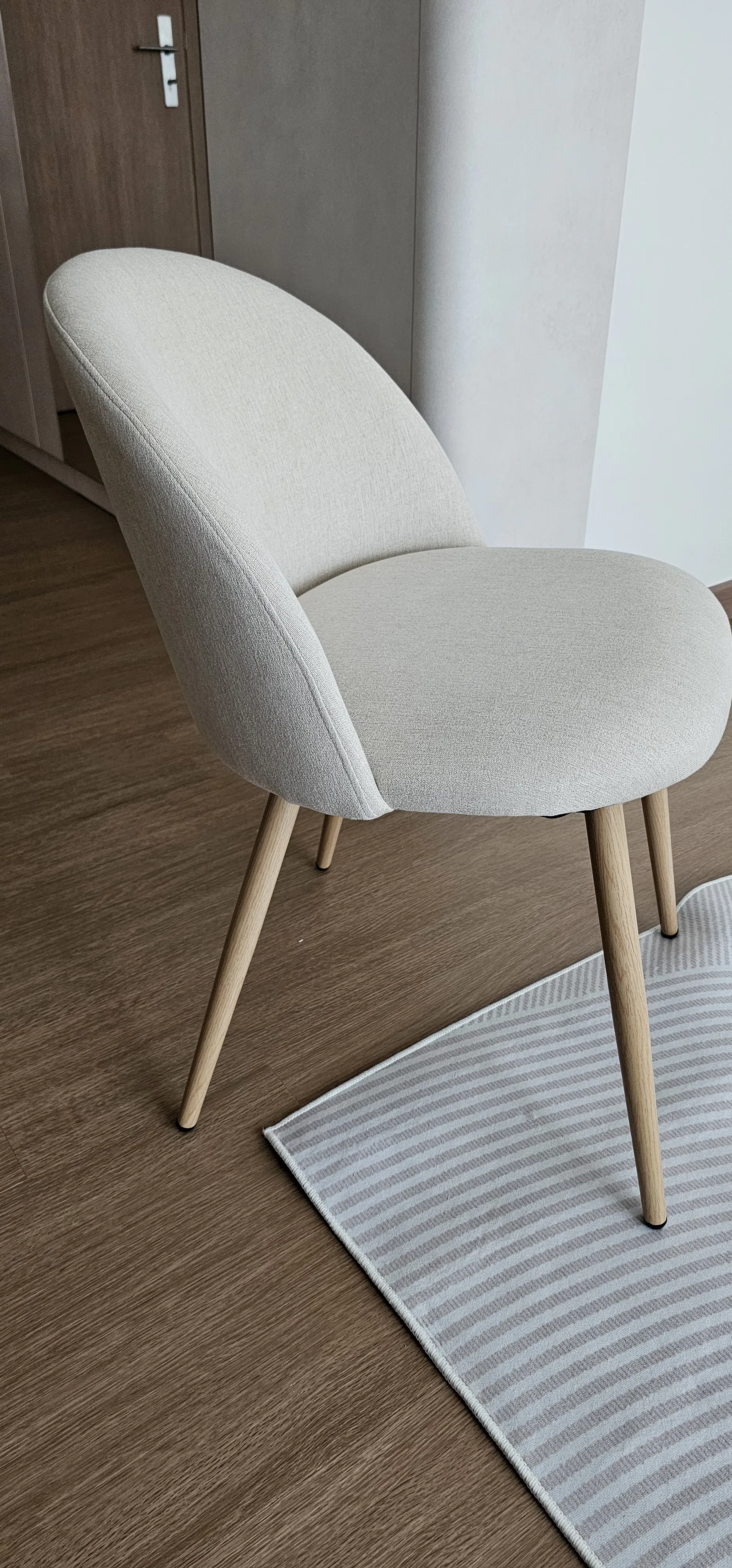 Customer home photo 1: Love the soft curves which makes dining space not so rigid. It is surprisingly comfy. Bonus, is the price point. CS was great ; helped to consolidate my earlier purchase (online) & my on-day purchase (in store) deliveries to be sent out together, which was great!