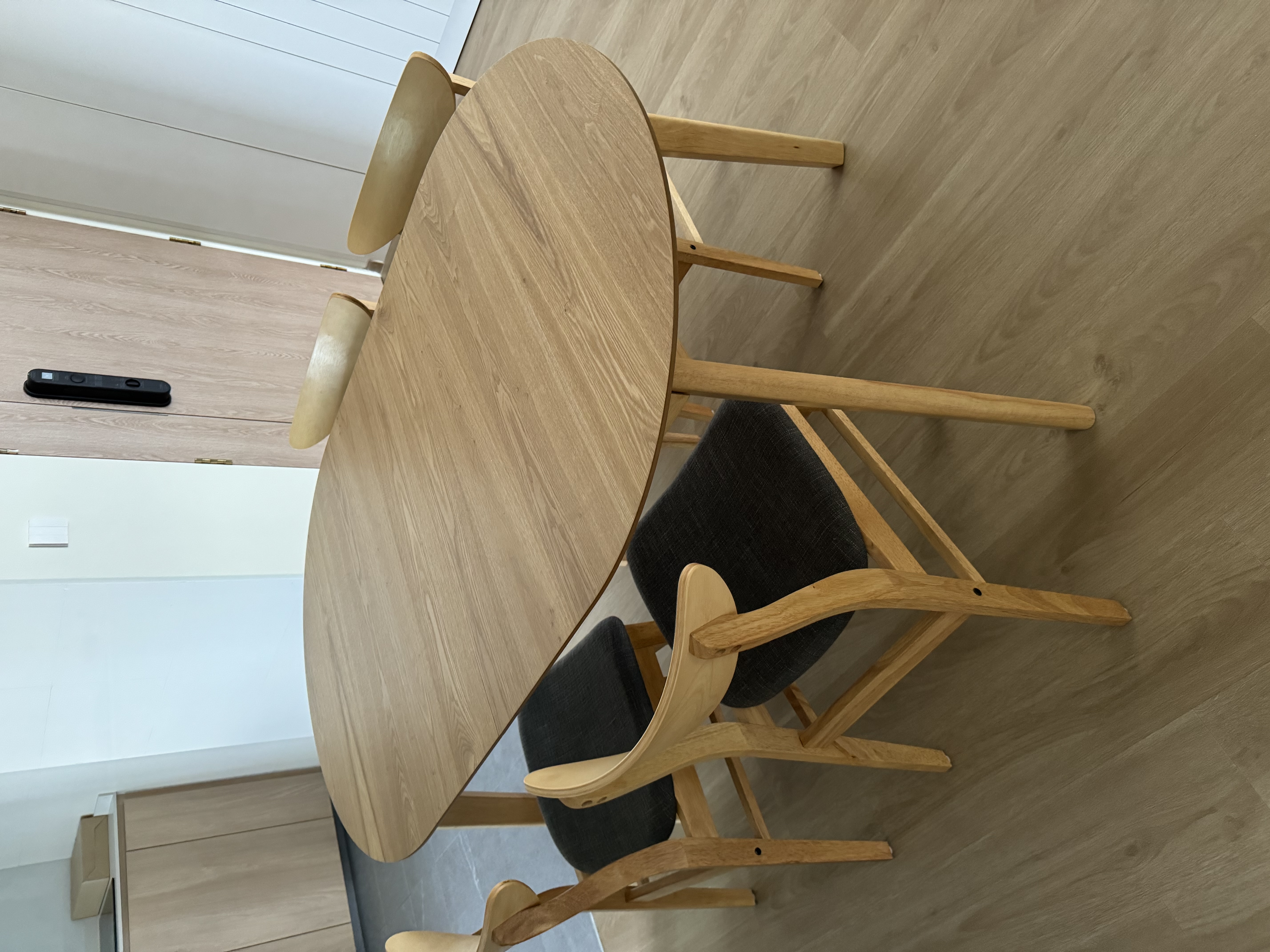 Customer home photo 6: Fits the table well. Adequately comfortable.