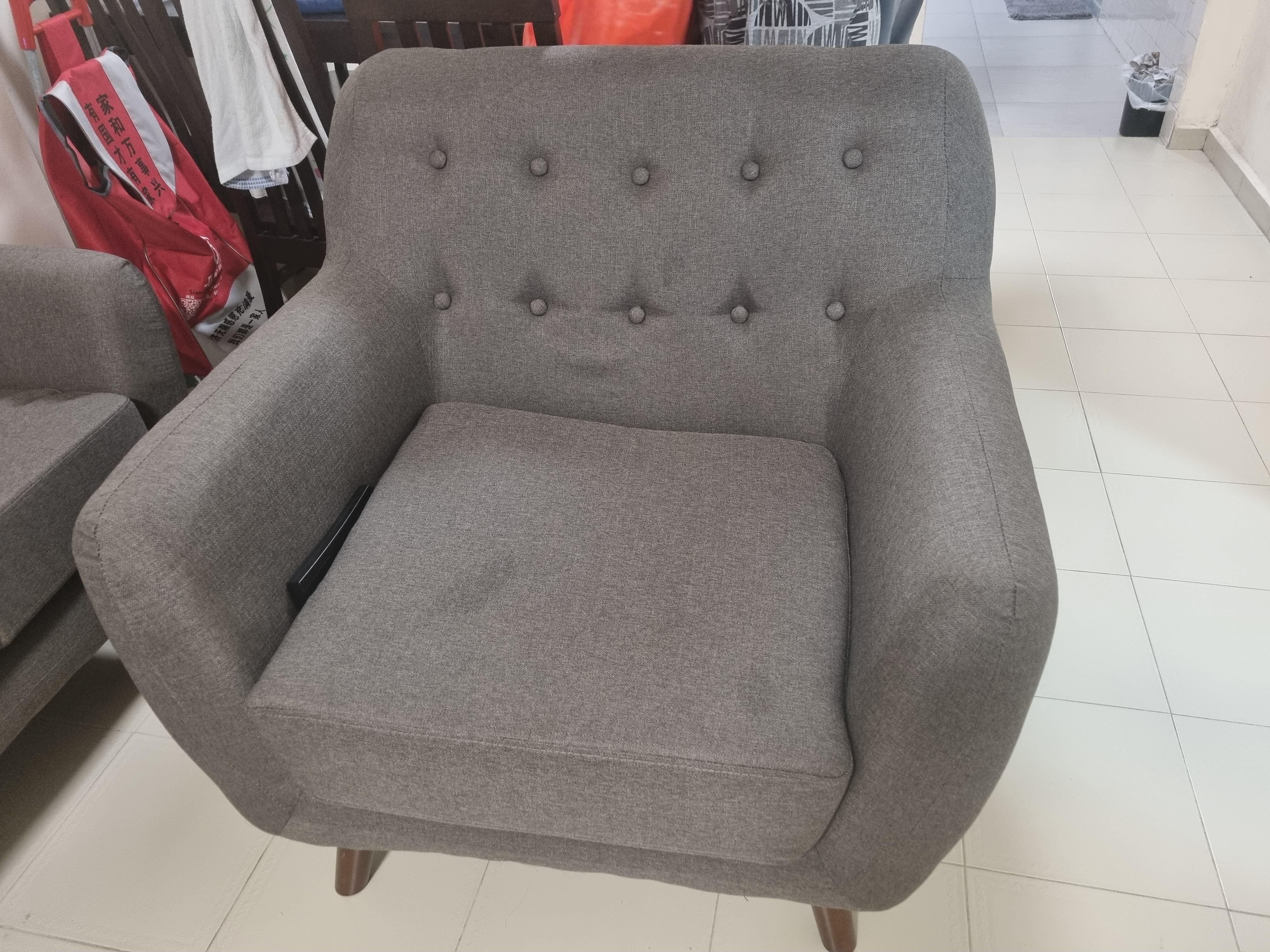 Customer home photo 3: Comfortable to sit on. Just a bit bulky. Great armchair if you have a little luxury of space.