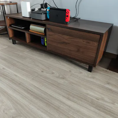 Customer home photo 6: Suitable for people that prefer low and non bulky tv console. Although small, able to place all my stuffs you can see in the photo. The side drawer is a plus point as most tv console with side drawer are very expensive. This is very affordable.
