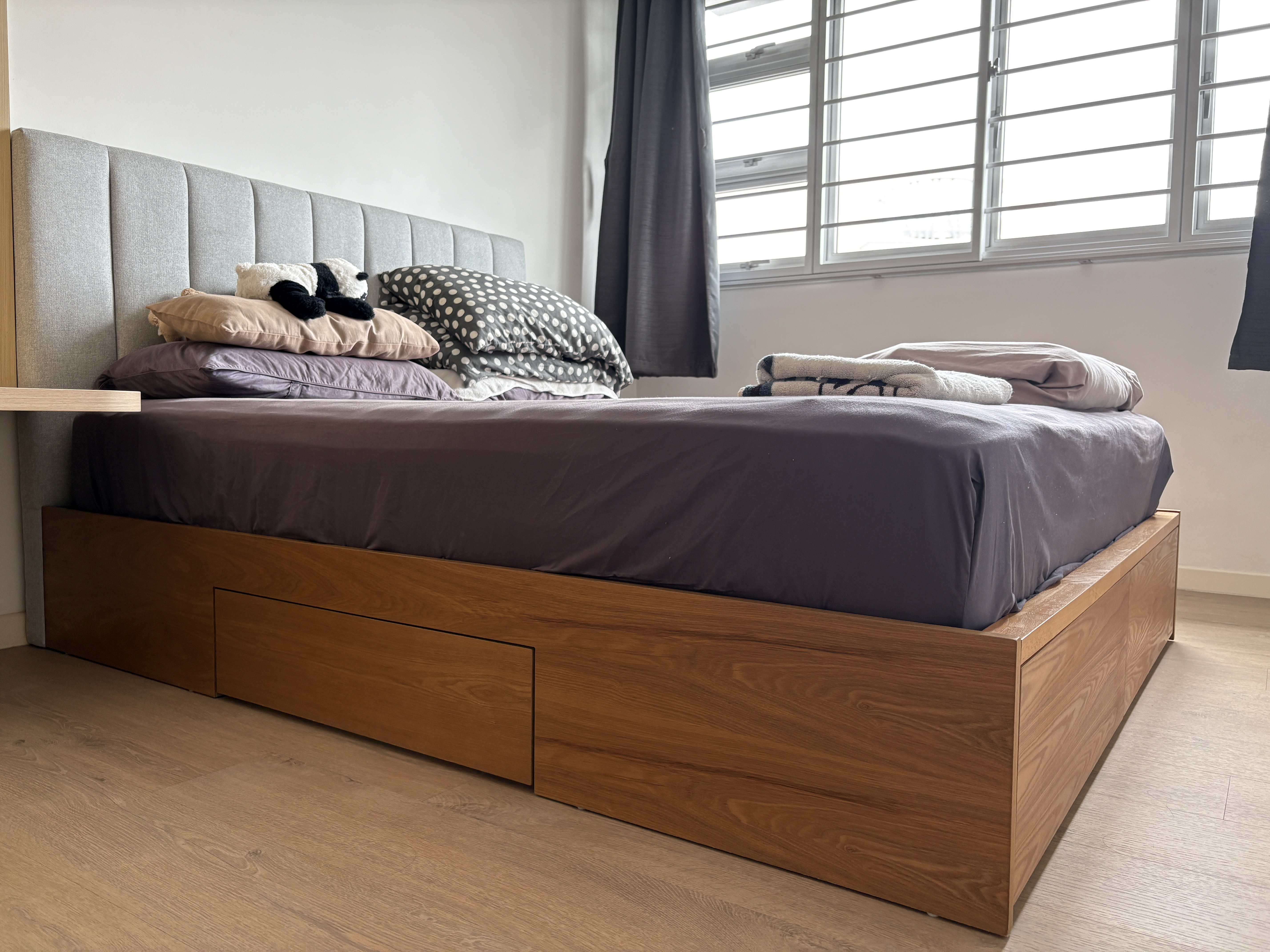 Customer home photo 1: Very amazing bed frame. Comfortable headboard. Love the roomy drawers, 2 for each person.