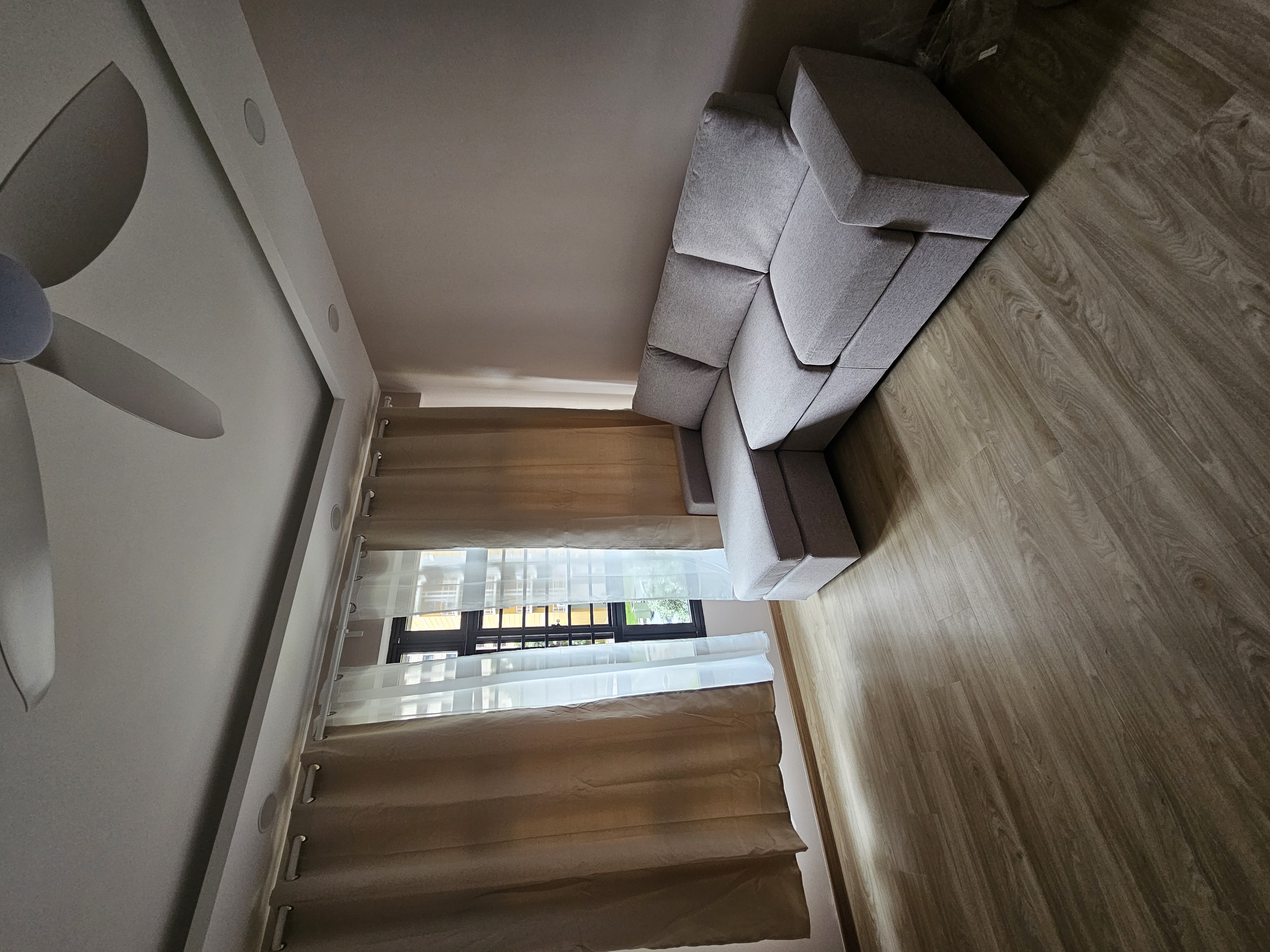 Customer home photo 2: The sofa is awesome. Interchange L shape make i more flexible on the position of the sofa. And the  material very nice. Sofa is not too soft and not to hard.