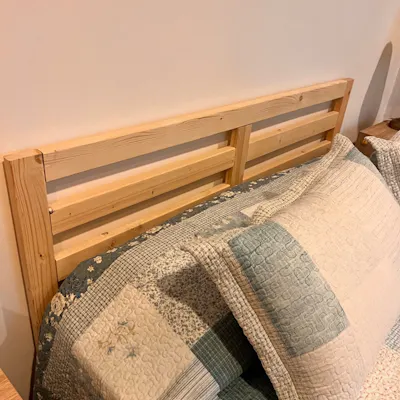 Customer home photo 4: Love the color and how cozy my bed looks with this headboard.