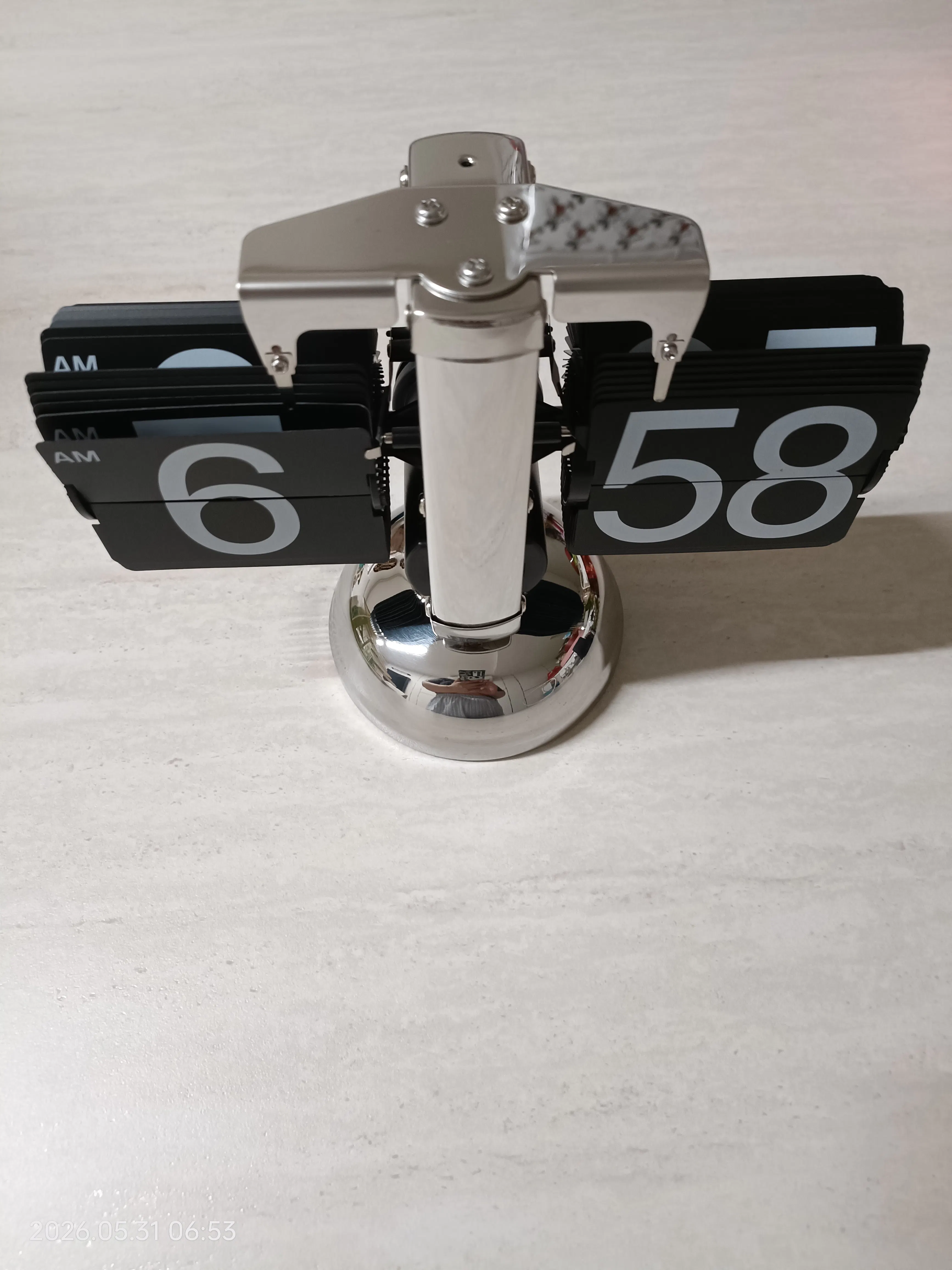 Customer home photo 1: Product is well protected, received it in good condition.  A stylish clock, looks good and fit well. Easy to set the time, just follow the manual which is provided. Required one D size battery which is not included.