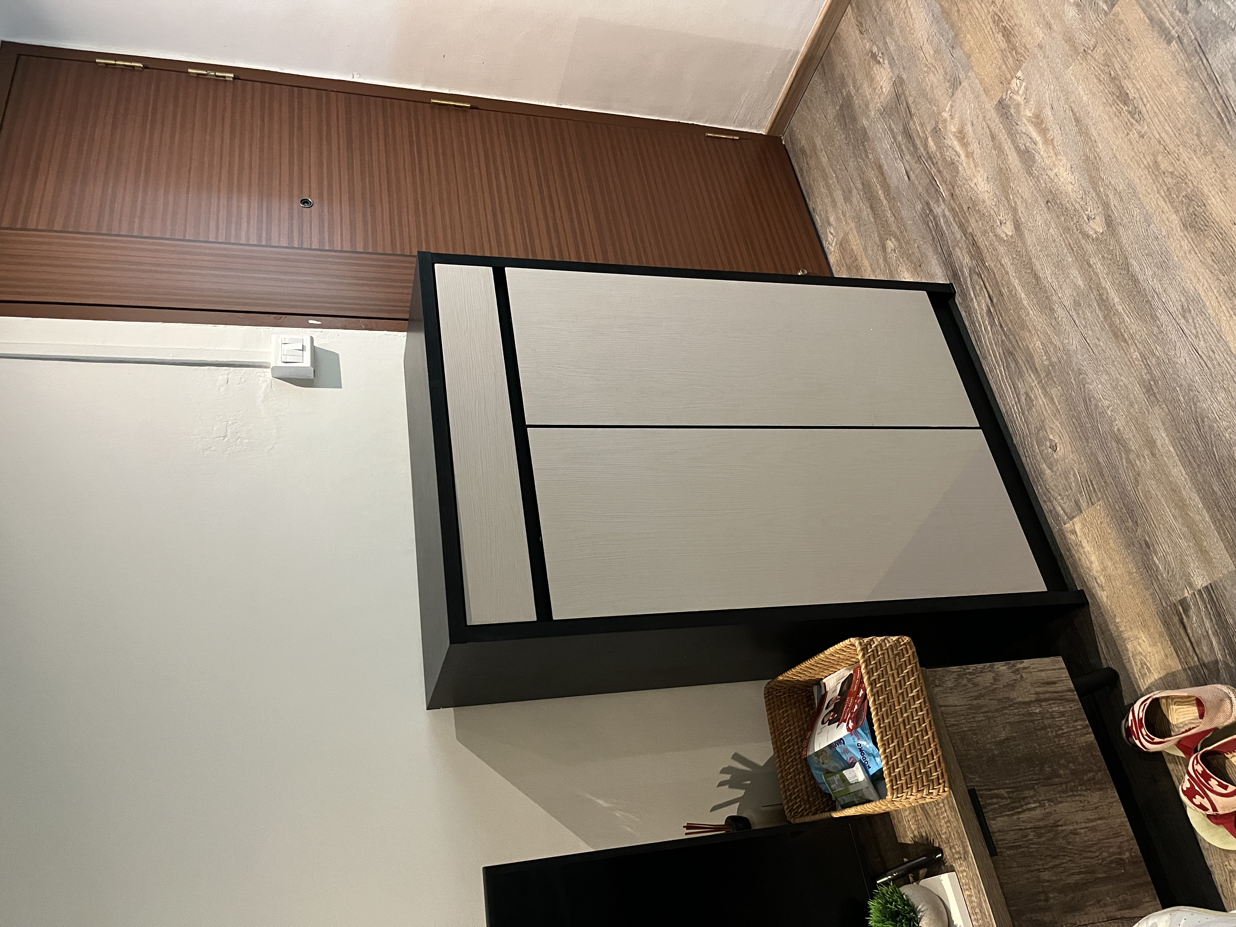 Customer home photo 1: overall looks good and sturdy. however there is a small gap between the top panel board and the back panel. the back panel board is longer than it should be.