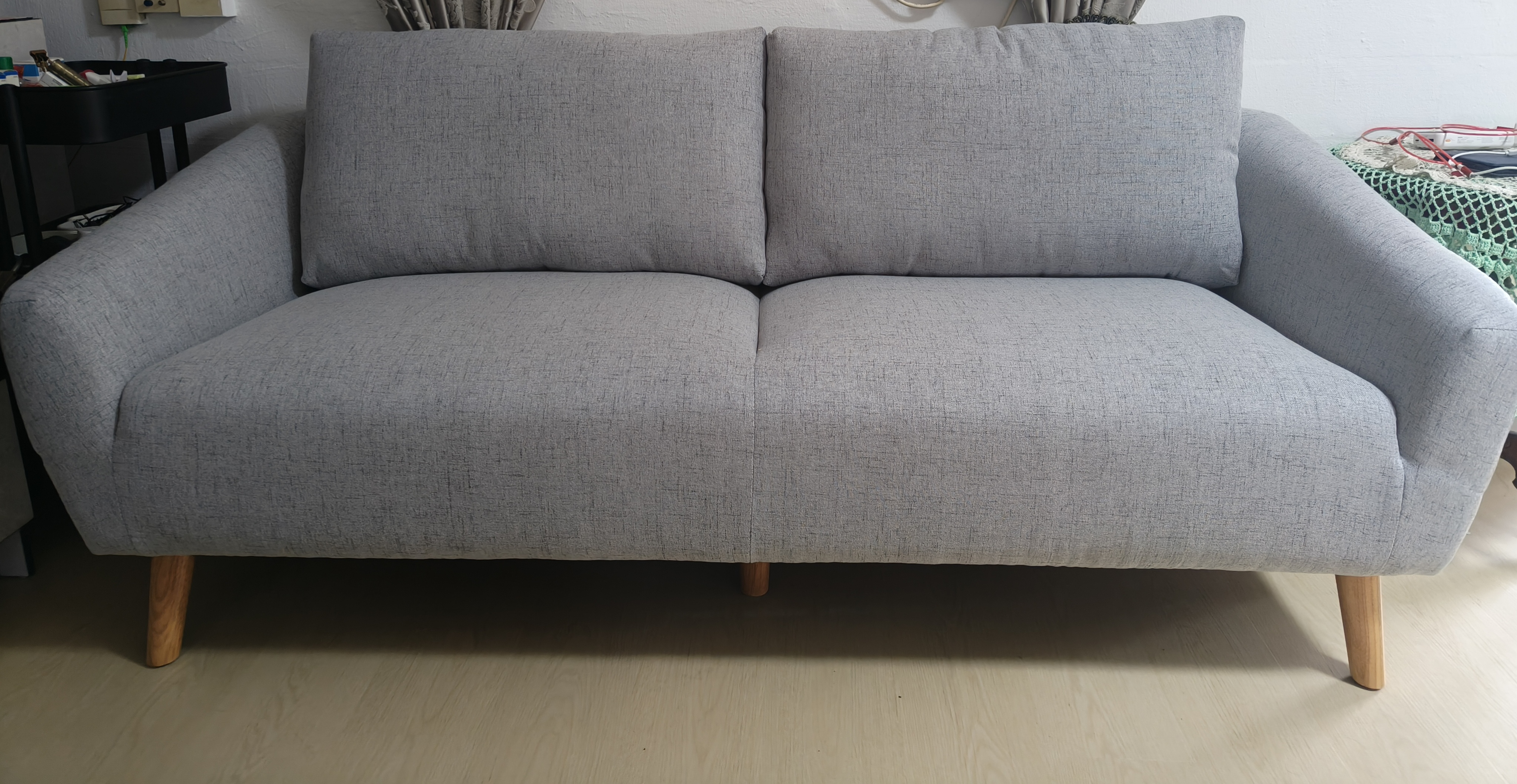 Customer home photo 12: The sofa was delivered on time. My mum was delighted when she received the sofa. Quite firm and it matches the colour of her vinyl flooring nicely.