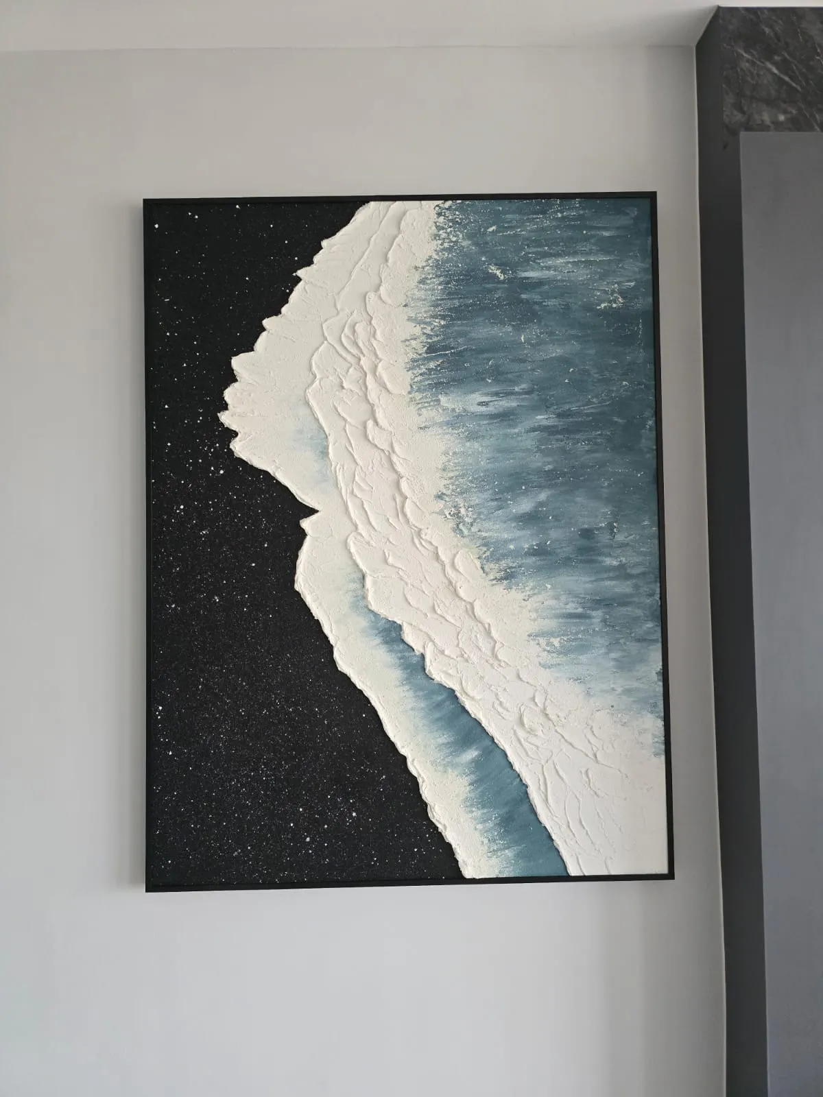 Customer home photo 1: Beautiful painting which fits my house theme. Came with a frame. Only thing is we have to drill the painting ourselves
