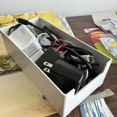 Customer home photo 22: Helpful for organizing makeup and charging cords, but fits easily in a drawer so works for anything
