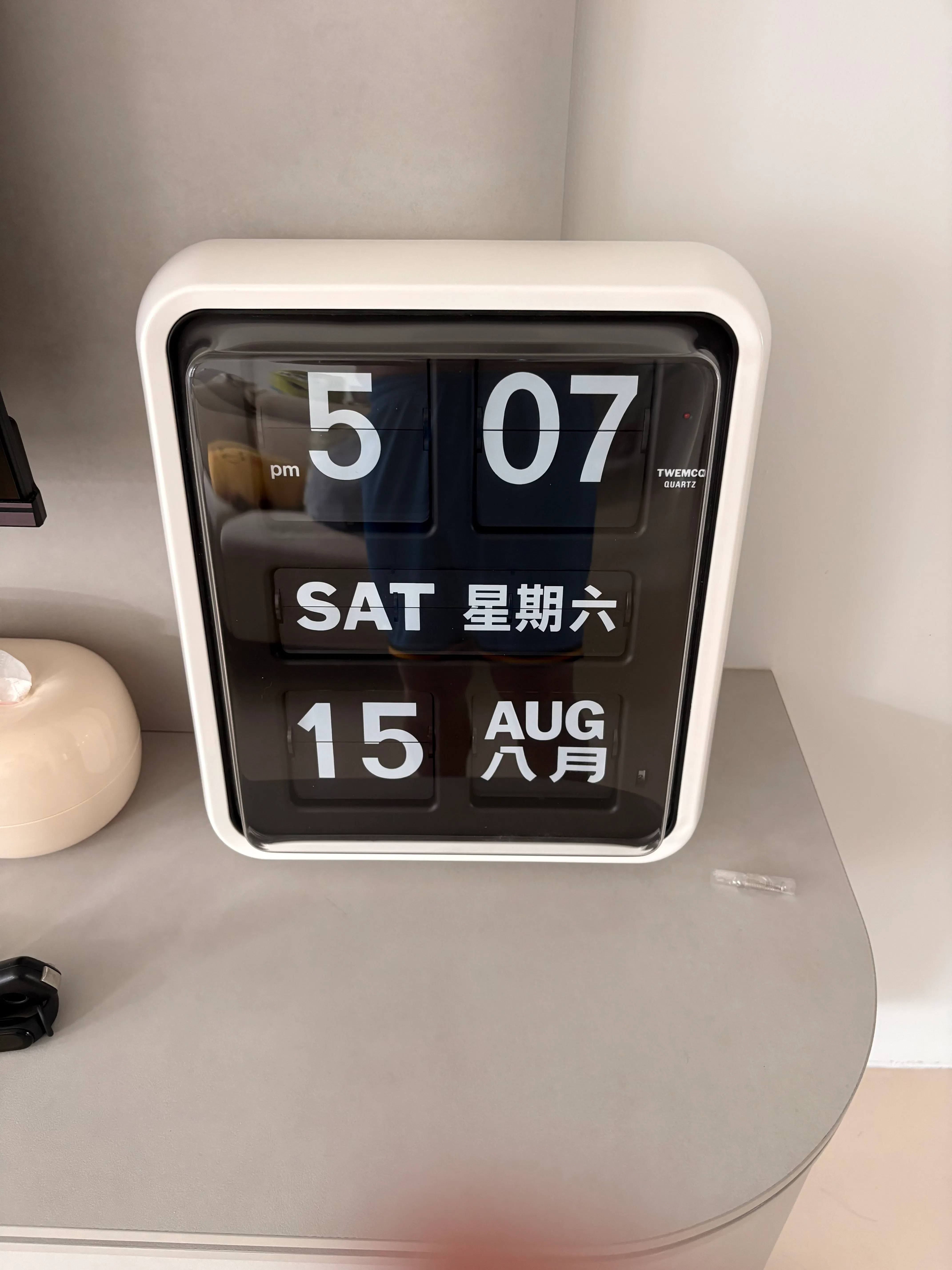Customer home photo 1: Been wanting a Twemco clock in my residence. Finally bought it together with my spouse. It just spruces up the whole overall aesthetic of our place. Loved it. 

The Twemco clock works well. And it makes a unique flip sound that’s distinctly Twemco.