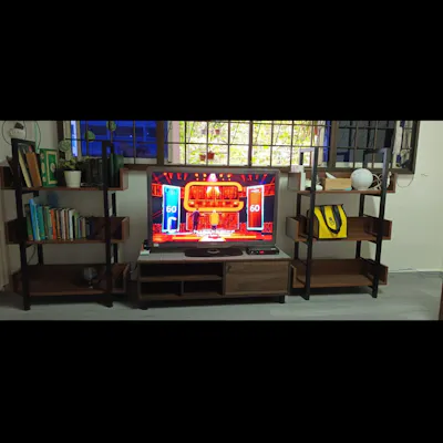 Customer home photo 3: Nice and suitable for my tv. The colour matches with my 2 display shelve