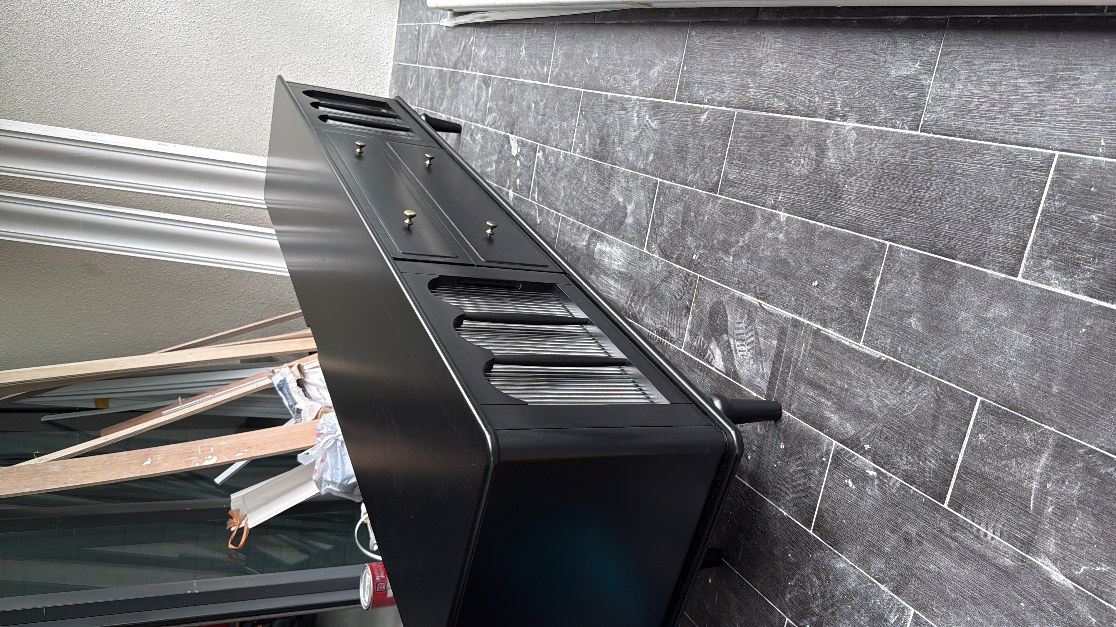 Customer home photo 1: The quality is not bad. Seems quite sturdy even with slim leg. A bit disappointed with the bottom drawer as its not smooth probably due to the alignment. Needed to use hard pressure to close the drawer. Feedback to the installer but was told there's nothing they can do.
