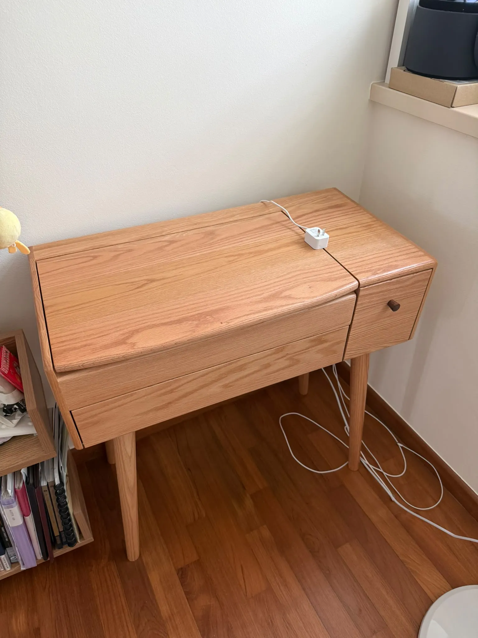 Customer home photo 5: I bought this table for my girl, and she loves it. Look exactly like the one online. However, the plug is not the usual one we used in SG. I understand the product may b imported from overseas, I thot it will be good if Hipvan shd at least change the plug to local use. Something to note if u looking at buying this table