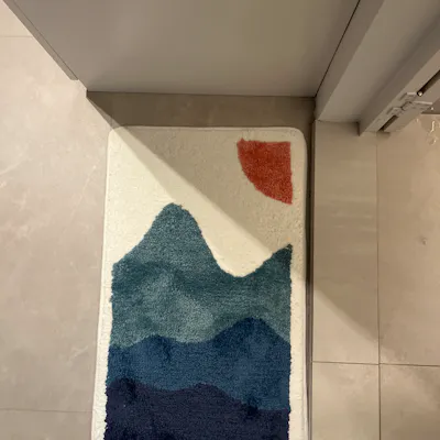 Customer home photo 1: Looks exactly like it does in the pictures! Love the aesthetic of this and hope it is as absorbent as it’s supposed to be :)