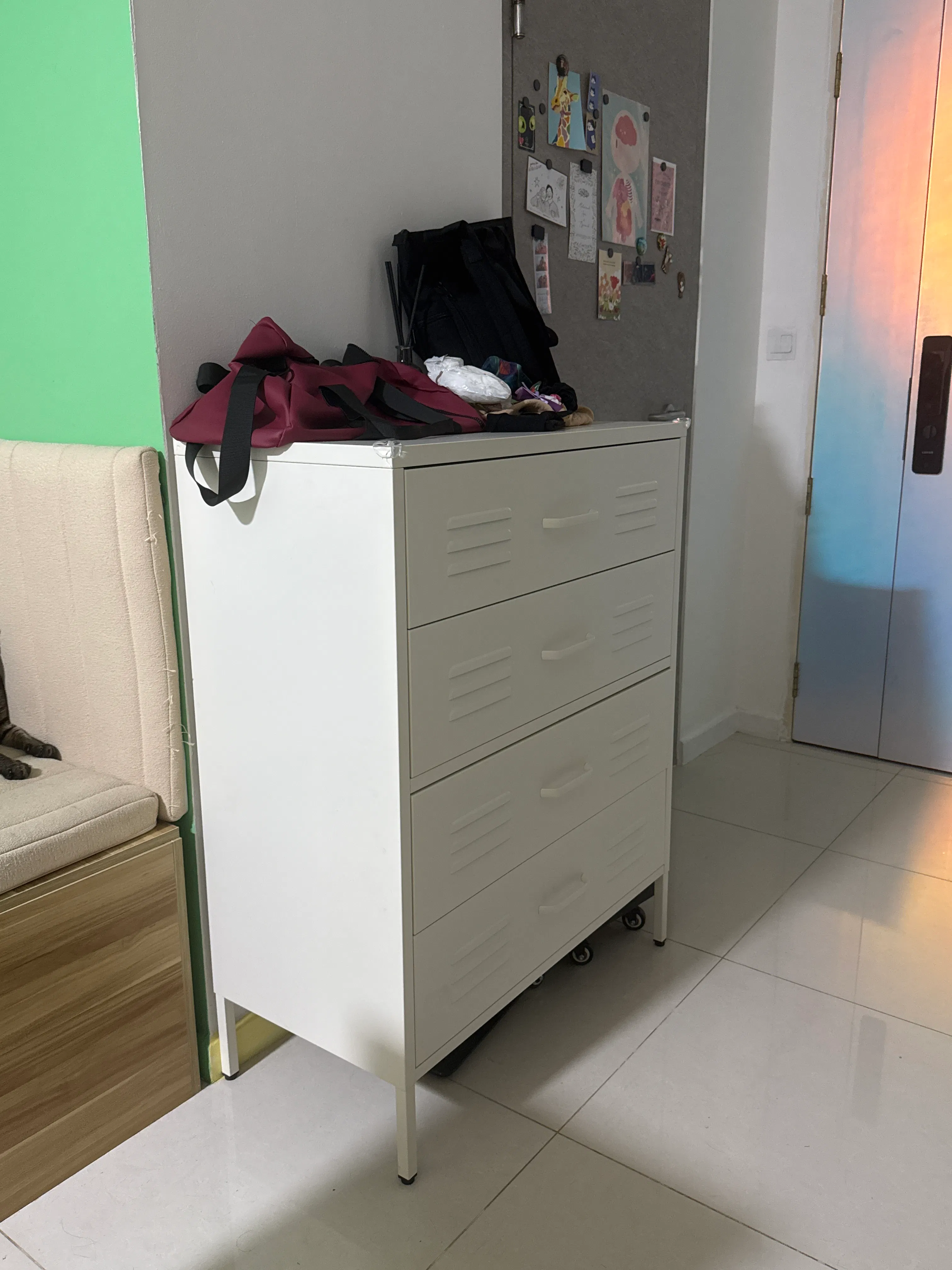 Customer home photo 2: It's a perfect fit right next to our store.
It's sturdy, able to keep plenty of my cats' can food and other things.
Good for our tissue storage as well.
It is magnetic, can put notes or other magnetic holders at the side for more use of space.