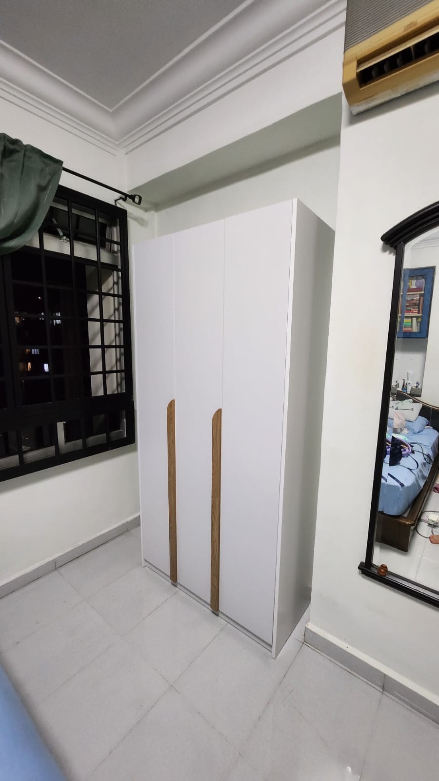 Customer home photo 12: Fits the corner of my room perfectly. Enough compartments to store all clothes.