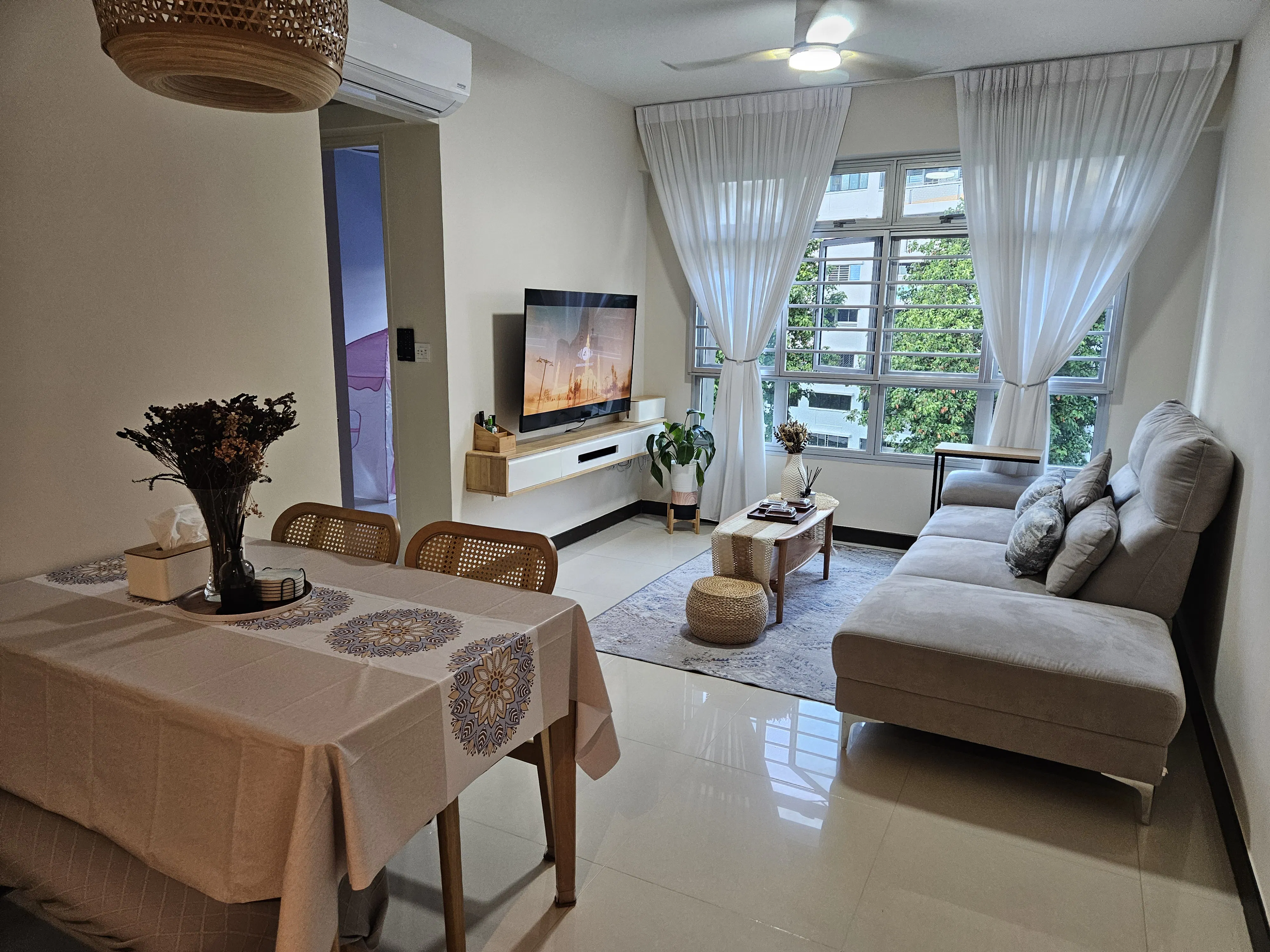 Customer home photo 1: It has a narrow width which i love, and it fits perfectly in my living room. The table is very solid and its quite heavy for its size. Great quality.