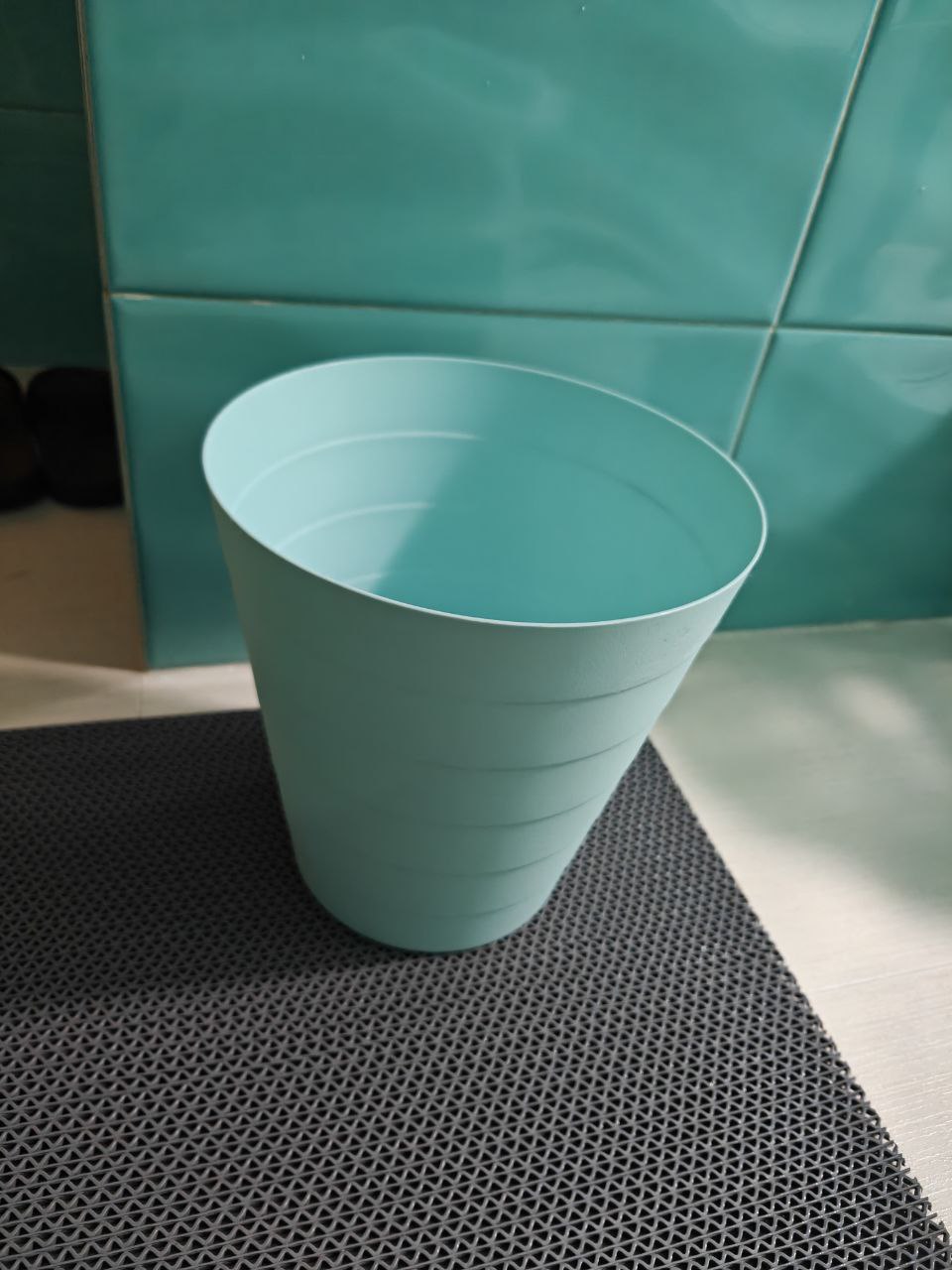 Customer home photo 1: Simple plastic bin, needed to clean it as it was a little dirty.