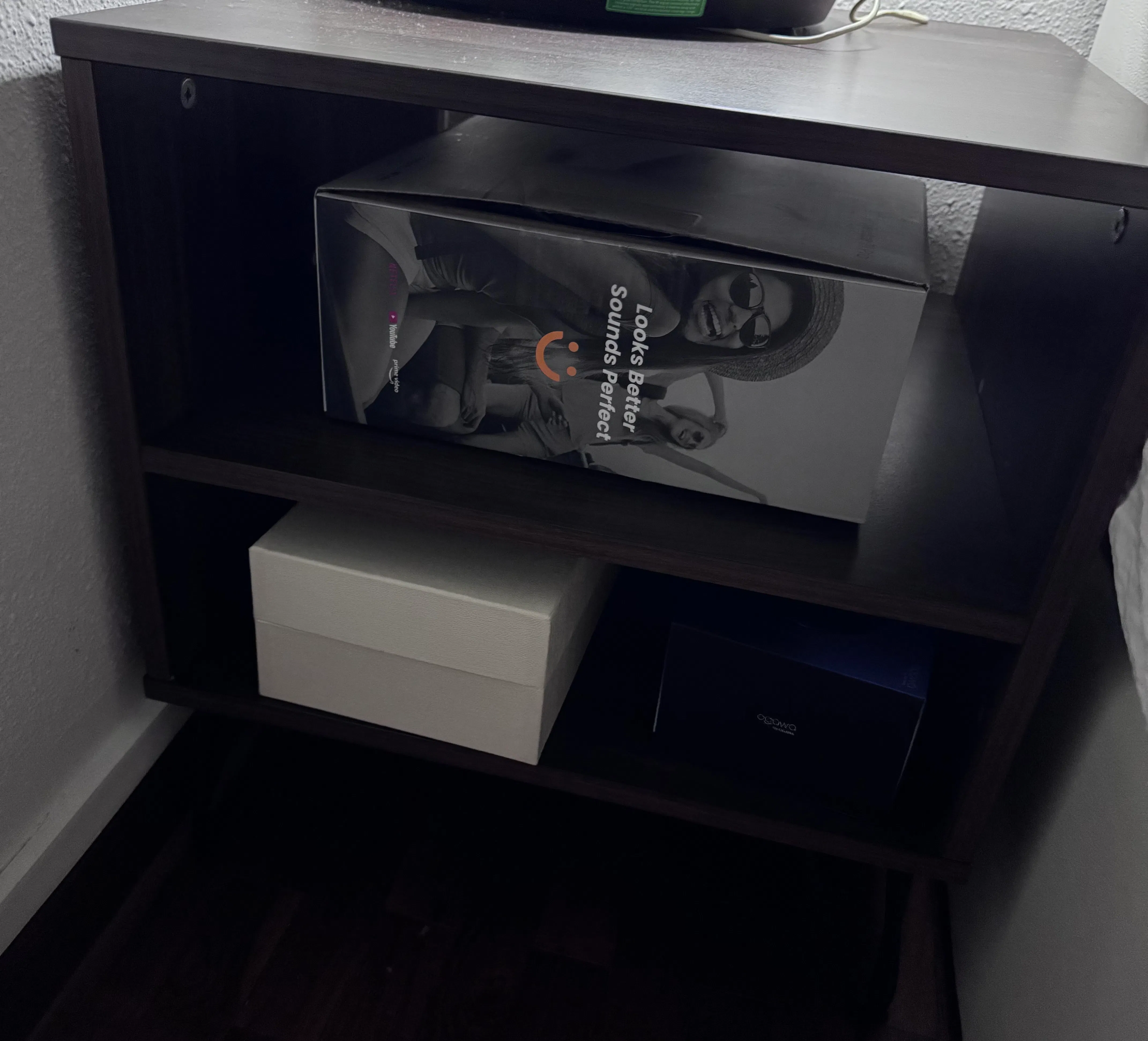 Customer home photo 1: Love the walnut colour and sturdy design, with no drawers so it can accommodate taller and larger items.