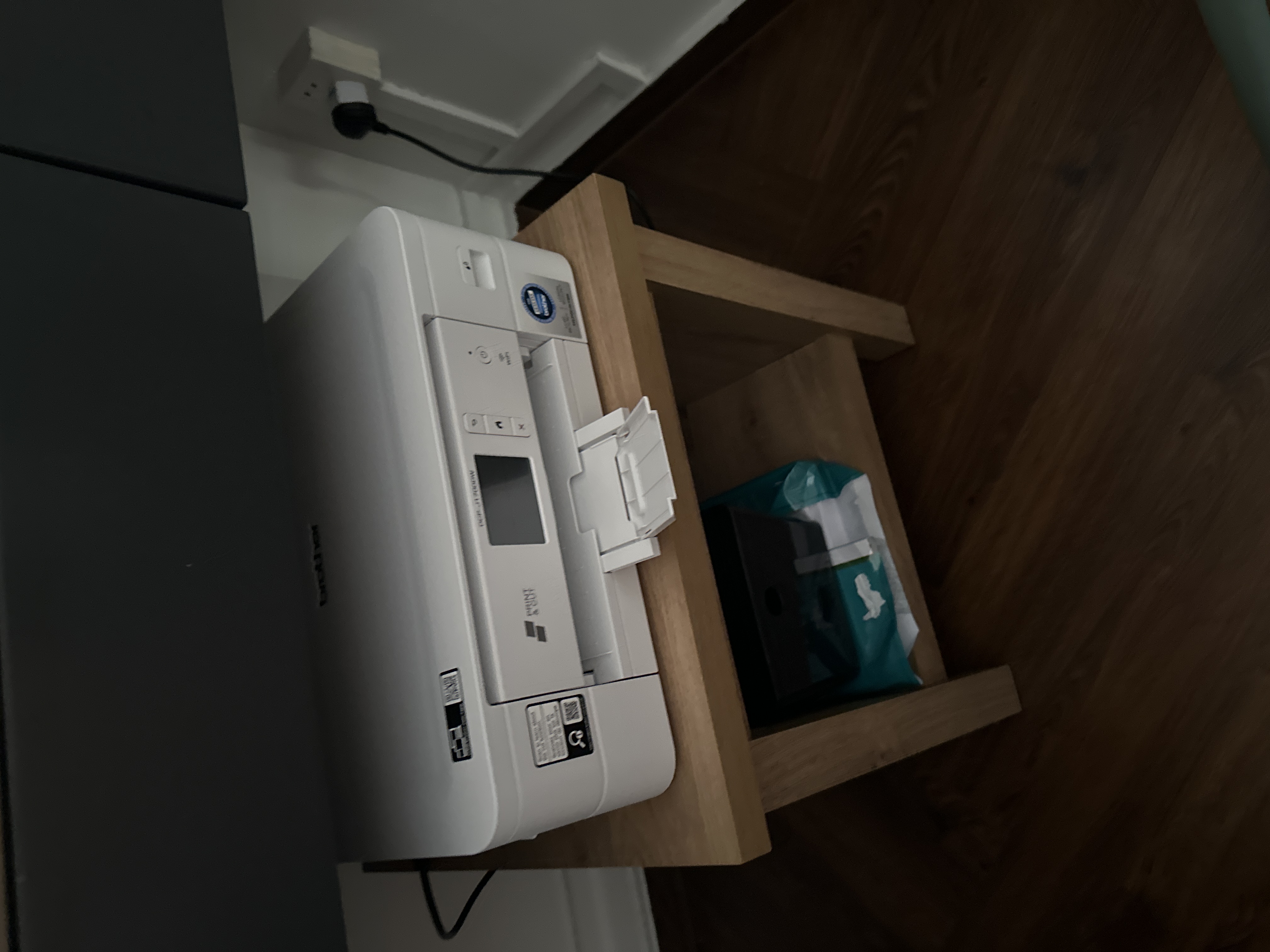 Customer home photo 1: Fits well under my study table to put the printer