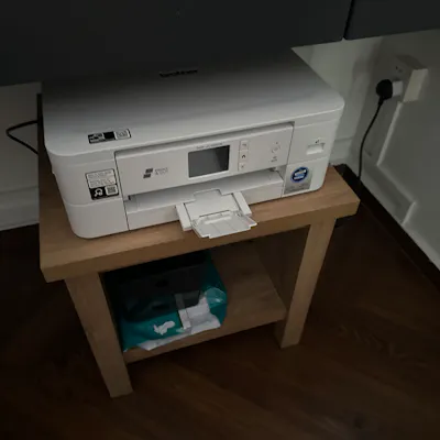 Customer home photo 1: Fits well under my study table to put the printer