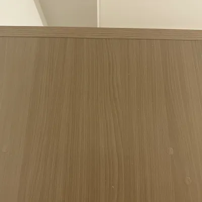 Customer home photo 1: The cupboard has a few stickers, likely used to cover some defects. Overall, it’s still better than my 3-door cupboard.