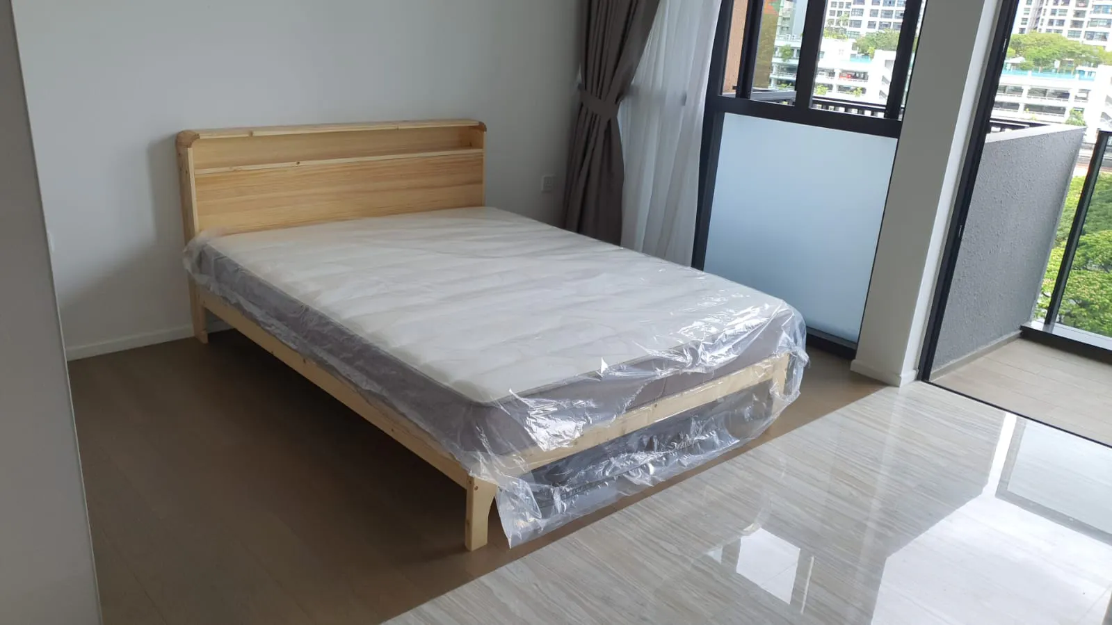 Customer home photo 7: I like the headboard, it help me to save space