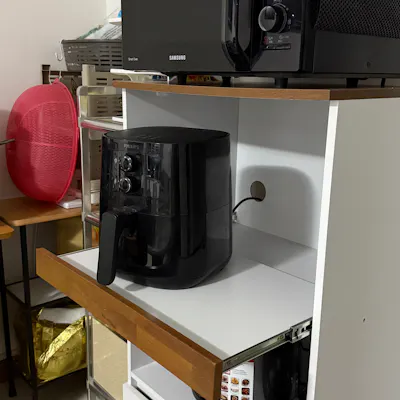 Customer home photo 2: look exactly like the photos, it is sturdy and can fit my appliances well.
